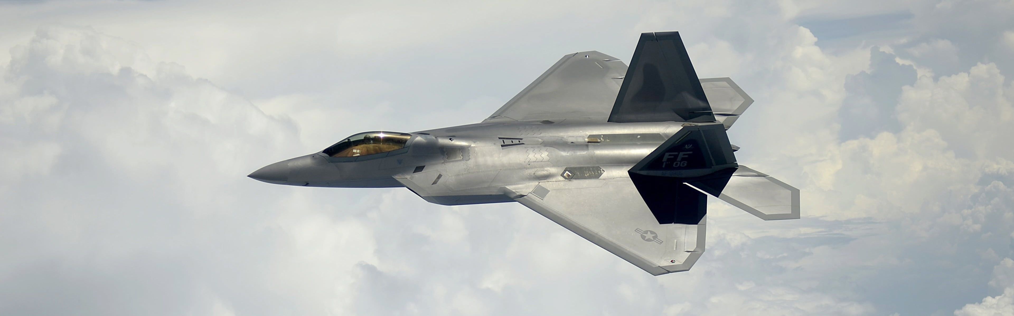 F-22 Raptor, Stealth aerial combat, US Air Force showcase, Power projection, Supersonic speed, 3840x1200 Dual Screen Desktop