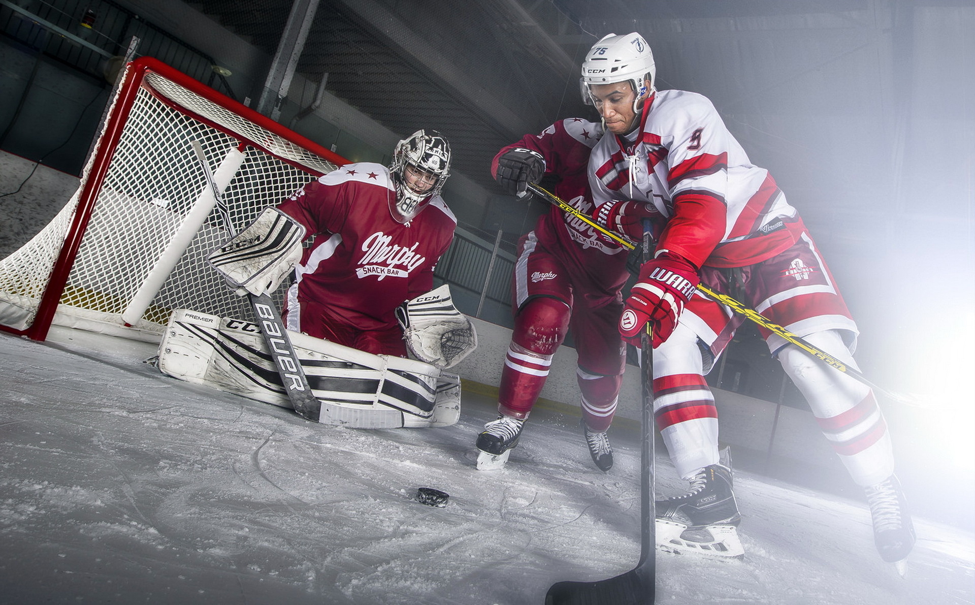 Hockey player playing, Athletic excellence, Skillful puck handling, Dynamic sports photography, 1920x1200 HD Desktop