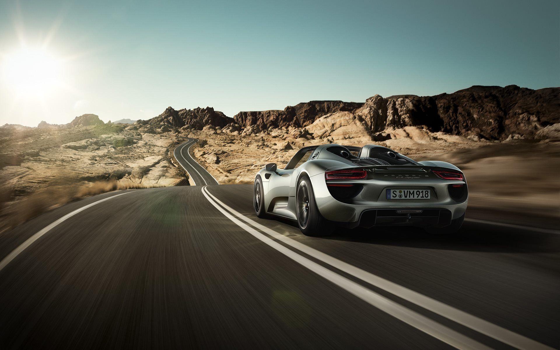 Porsche 918 Spyder, Winding desert road, Rocky canyon landscape, HD Desktop wallpaper
