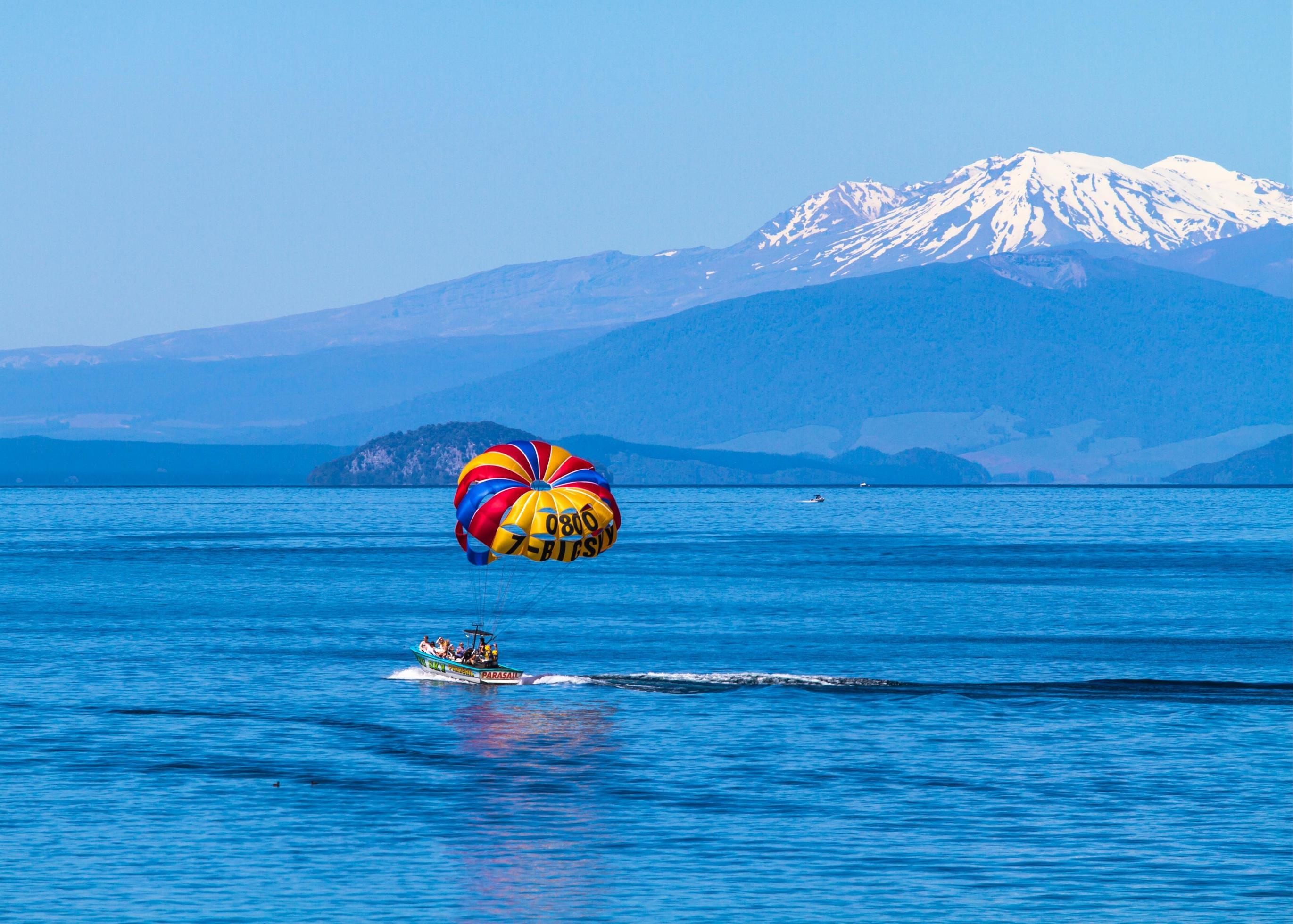 Parasailing in Taupo, New Zealand adventure, Boat ride near mountains, Beautiful stock photo, 2750x1960 HD Desktop