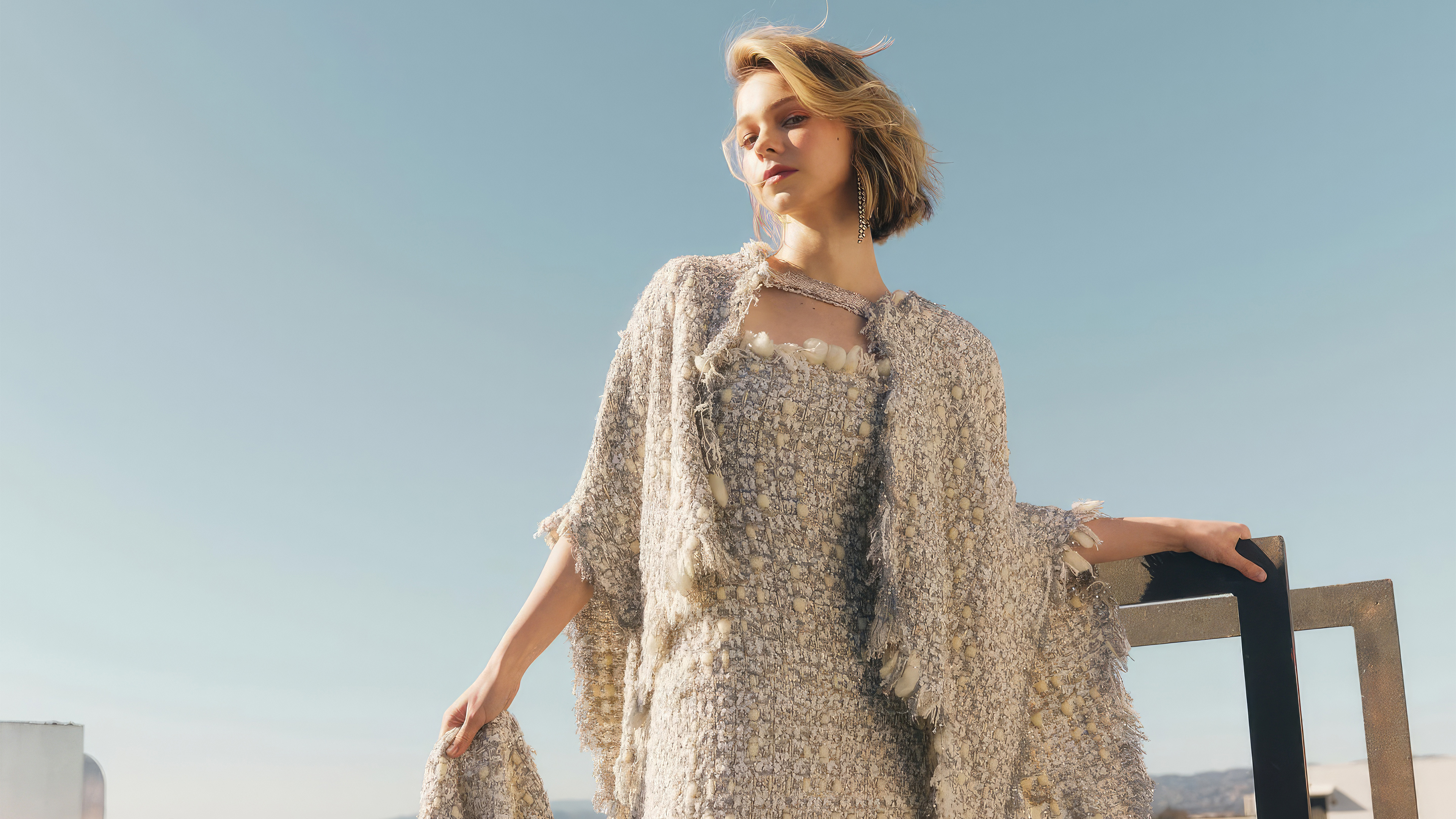 Emma Myers in fringed tweed dress, Boucle cape with frayed edges, Rooftop against clear sky, 4K Desktop wallpaper