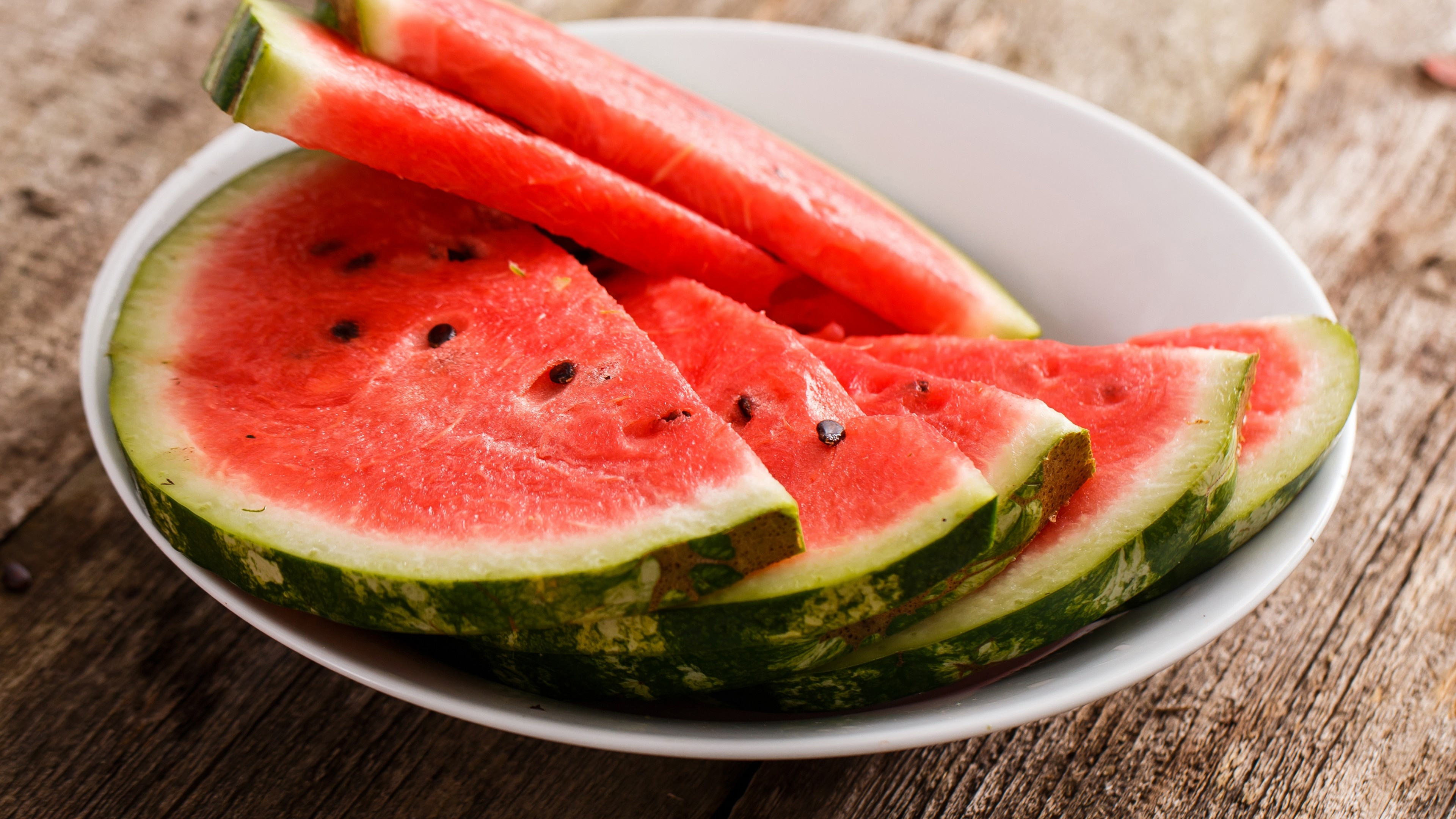 Watermelon on a plate, Freshly cut slices, Red and juicy goodness, Perfect for TV snacking, 3840x2160 4K Desktop