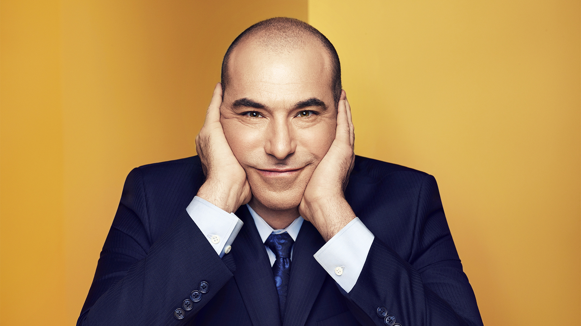 Louis Litt, navy blue suit, yellow backdrop, Full HD Desktop wallpaper