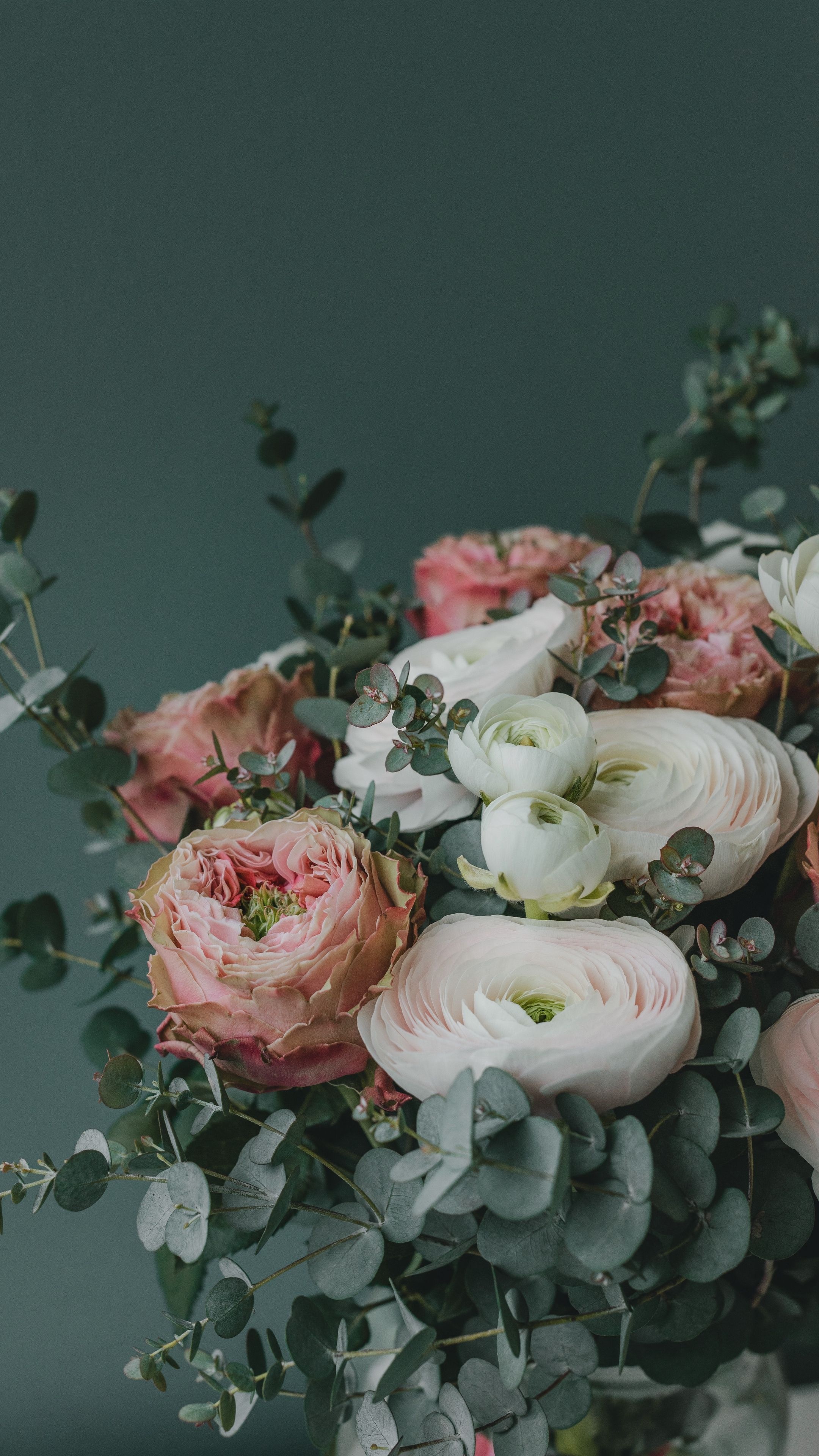 White ranunculus blooms, Pink garden roses, Eucalyptus foliage sprays, Dark teal wall, 4K Phone wallpaper
