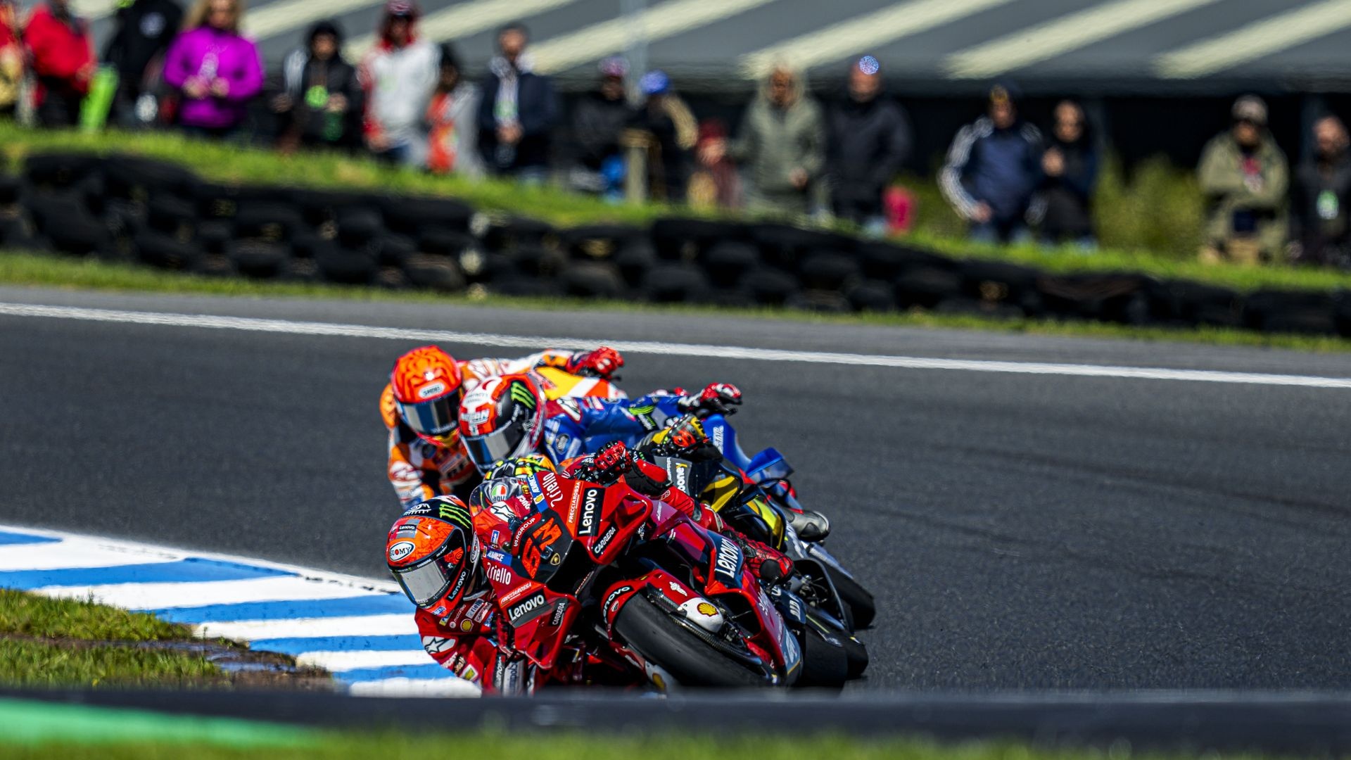 Francesco Bagnaia number 63, Ducati Lenovo Desmosedici GP, Repsol Honda rider chasing, MotoGP pack past tyre wall, Full HD Desktop wallpaper