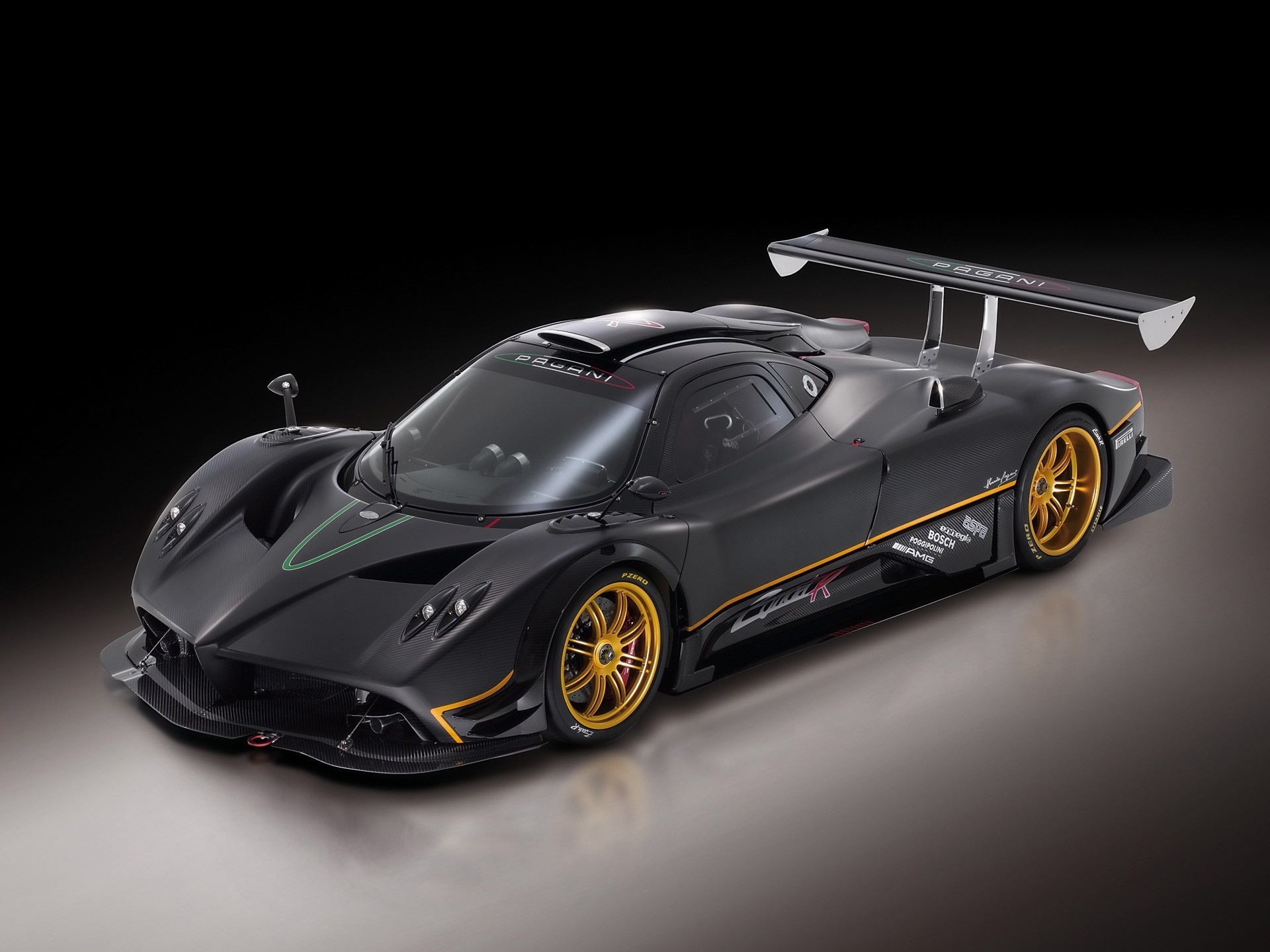 Pagani Zonda R, matte carbon fiber bodywork, gold multi-spoke wheels, HD Desktop wallpaper