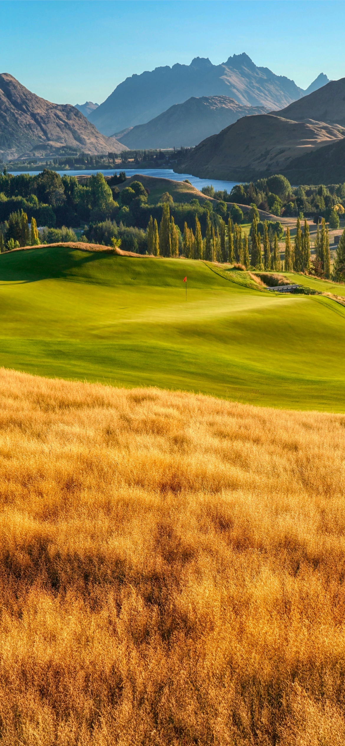 Golf Course, Mountain backdrop, Pristine lake, Par 3 challenge, 1170x2540 HD Phone