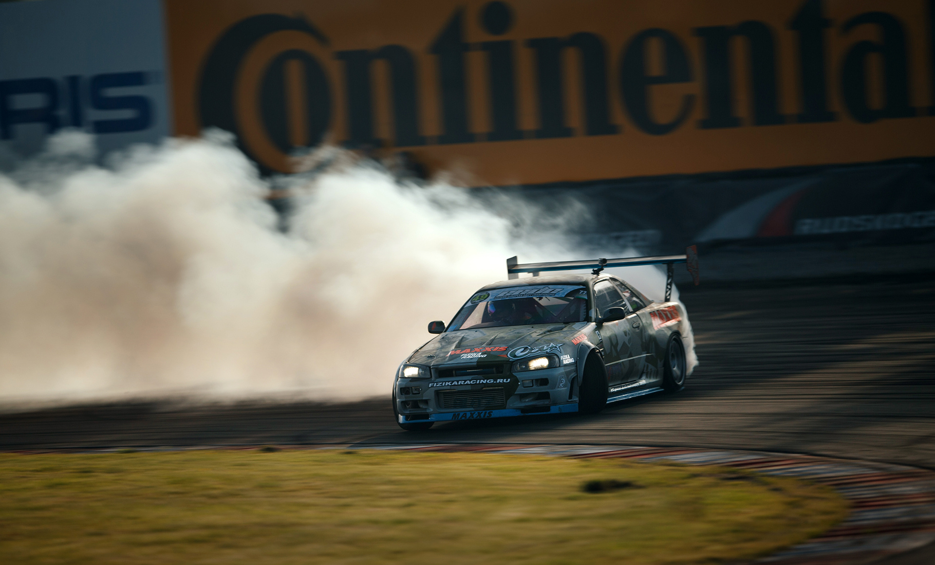 Nissan Skyline R34, Continental billboard, drifting tire smoke, HD Desktop wallpaper