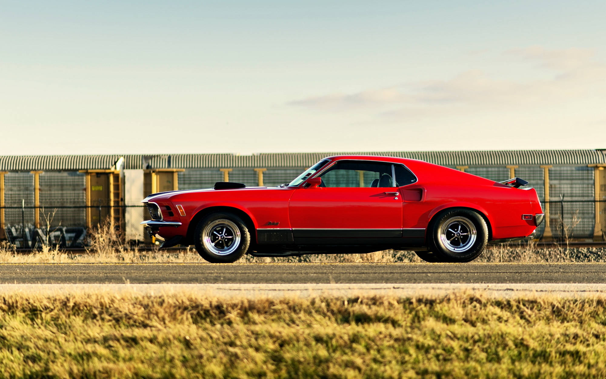 1969 Ford Mustang Mach 1, Red muscle car profile, Freight train railcars background, HD Desktop wallpaper
