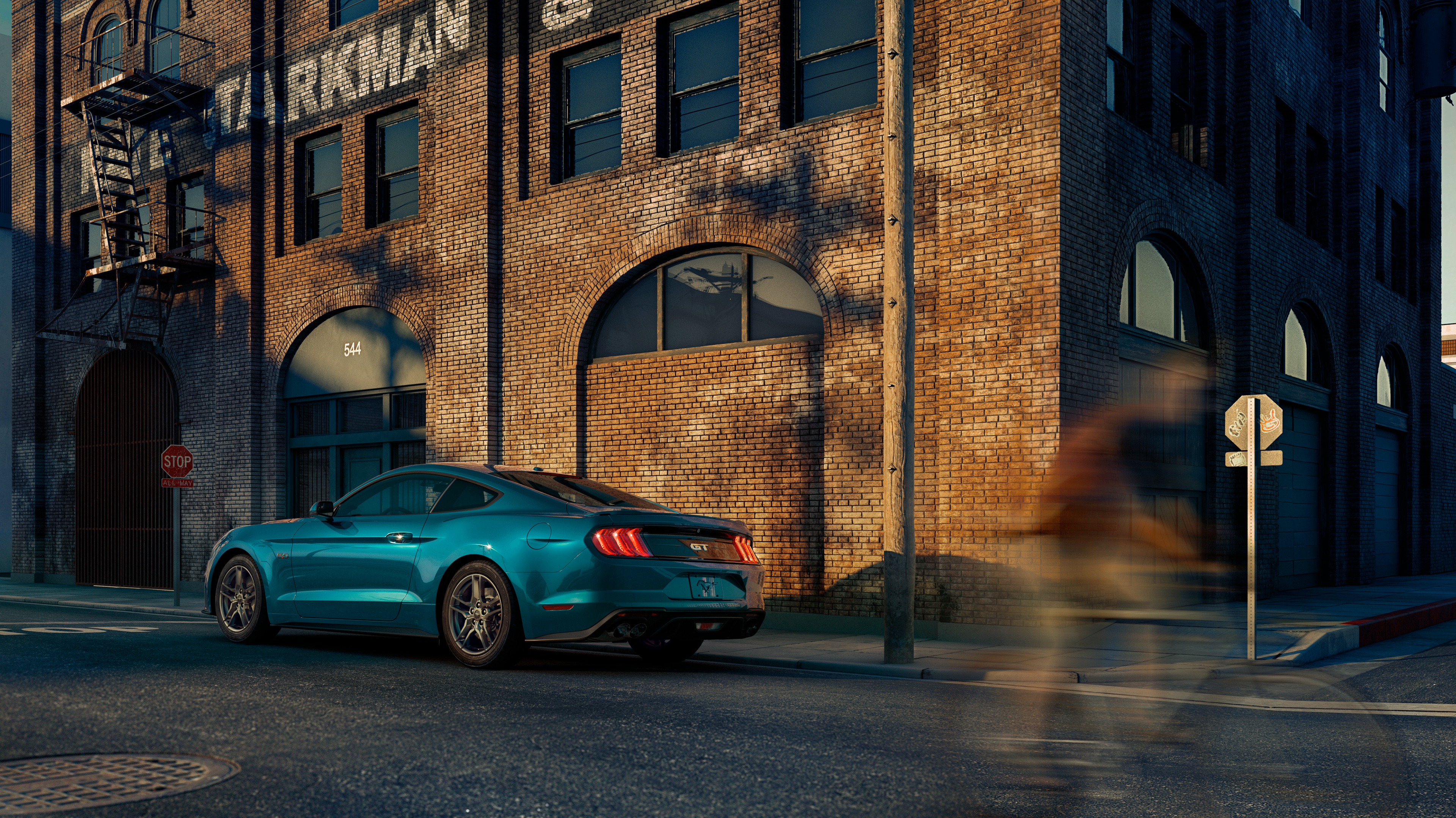 Ford Mustang GT, Industrial brick warehouse building, Motion blurred cyclist street corner, 4K Desktop wallpaper