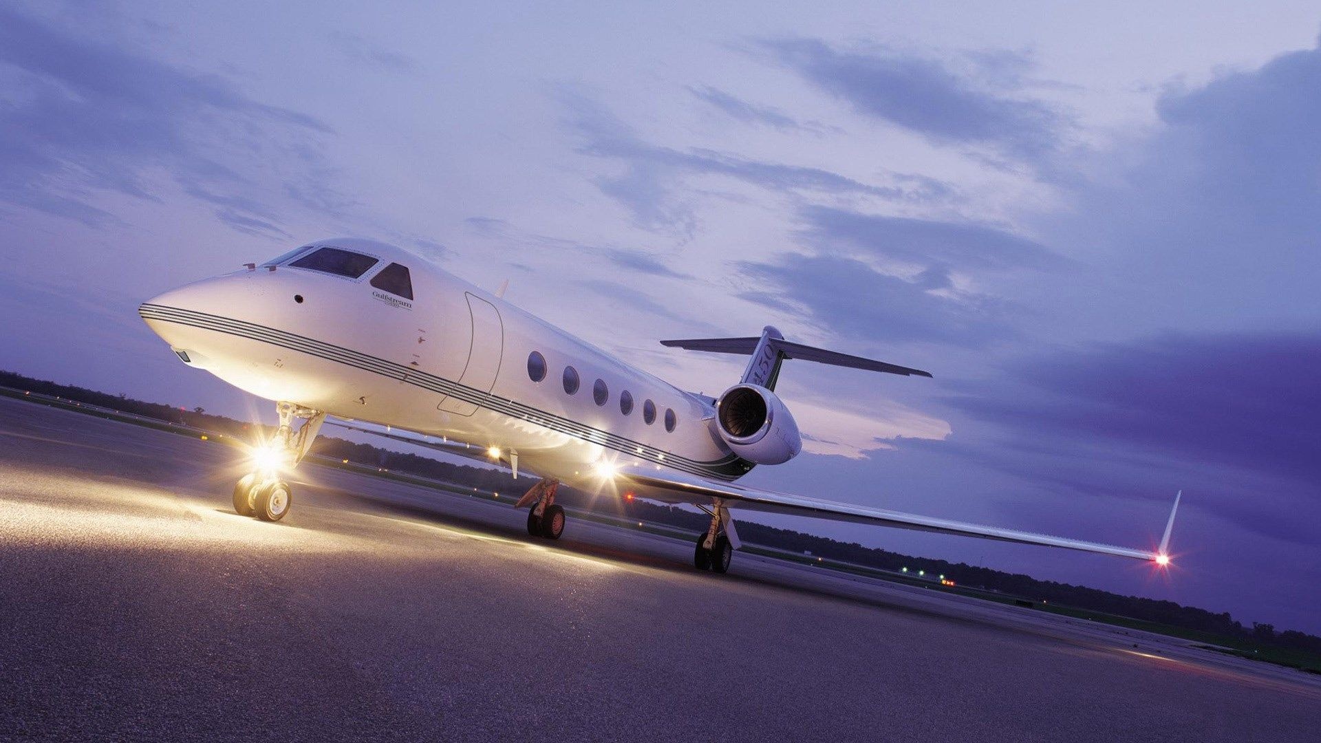 Gulfstream G450, Airport tarmac at dusk, Illuminated landing lights, Full HD Desktop wallpaper