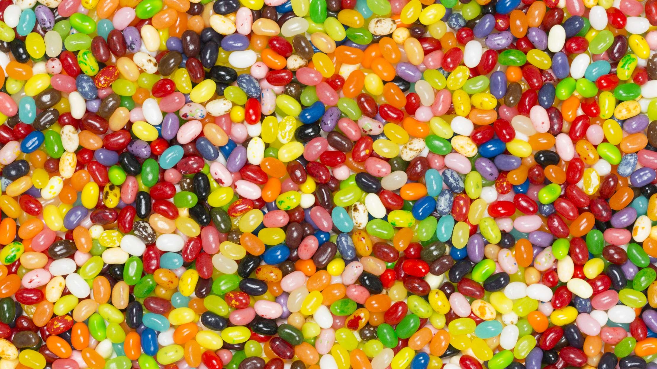 Michigan's favorite buttered popcorn flavor, Unique jelly bean, Local favorite, Popular candy choice, 2220x1250 HD Desktop