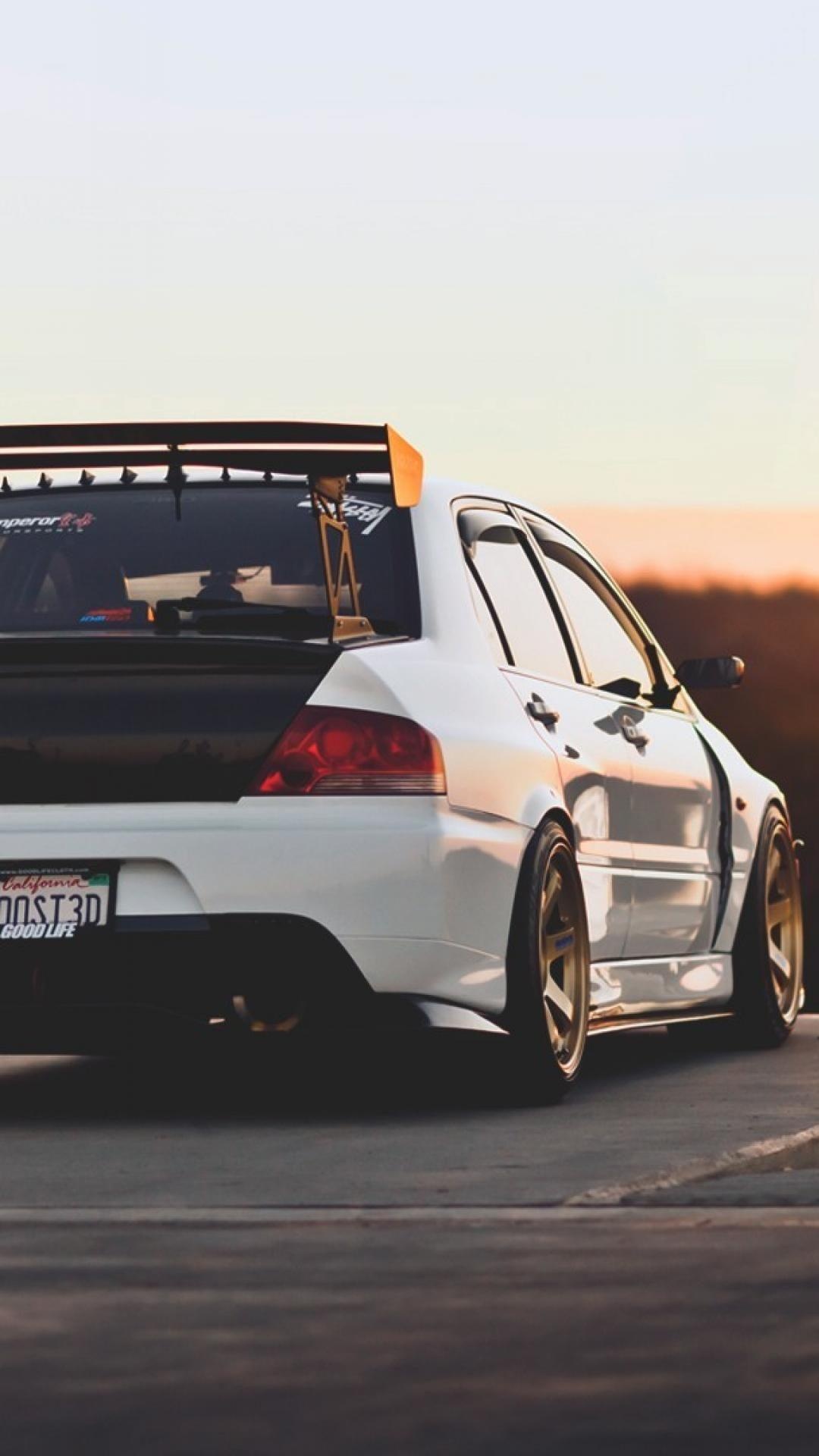Mitsubishi Evo 7, Performance powerhouse, Legendary status, Iconic design, 1080x1920 Full HD Phone