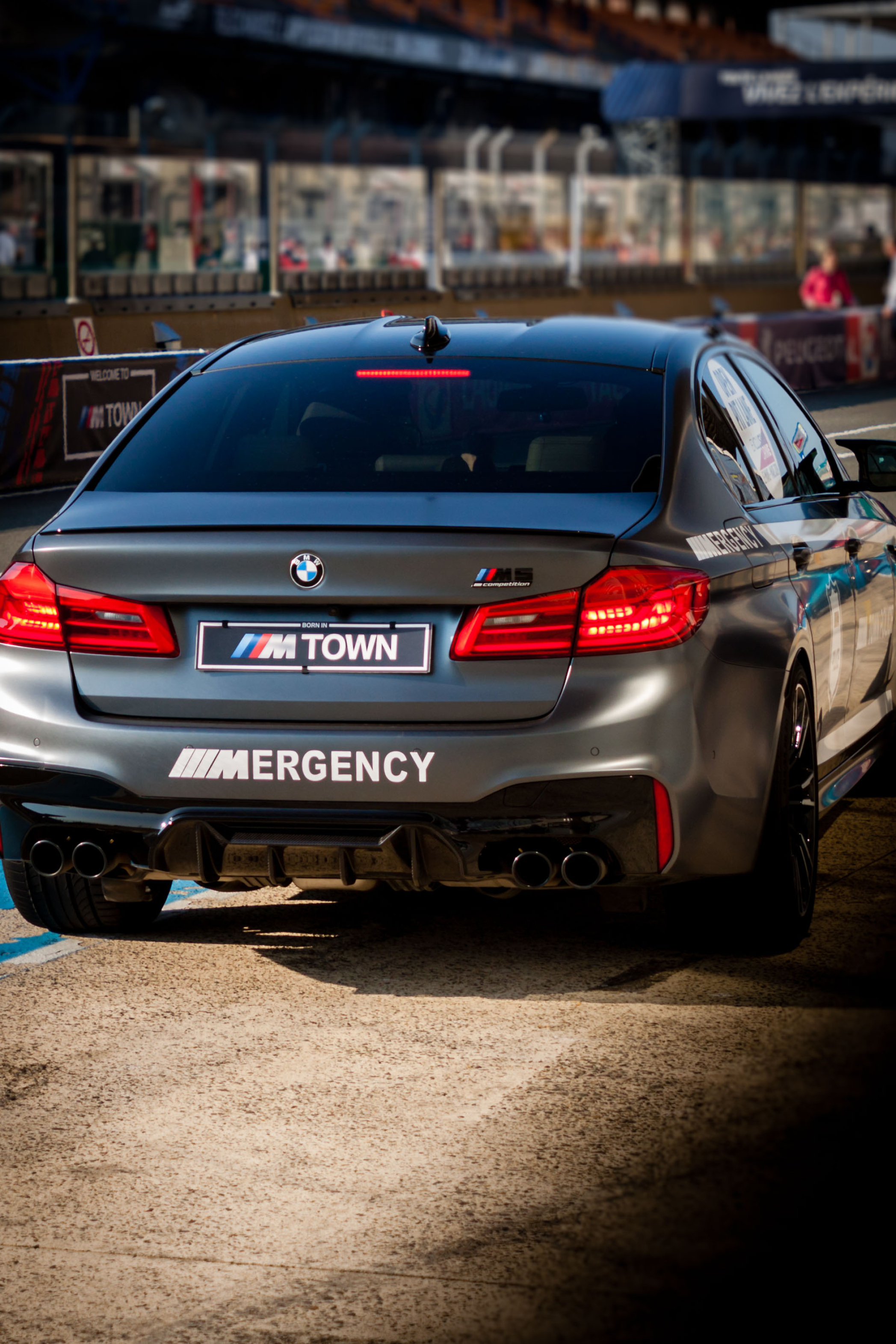 BMW M5 Competition, MERGENCY decal, race track pit lane, HD Phone wallpaper