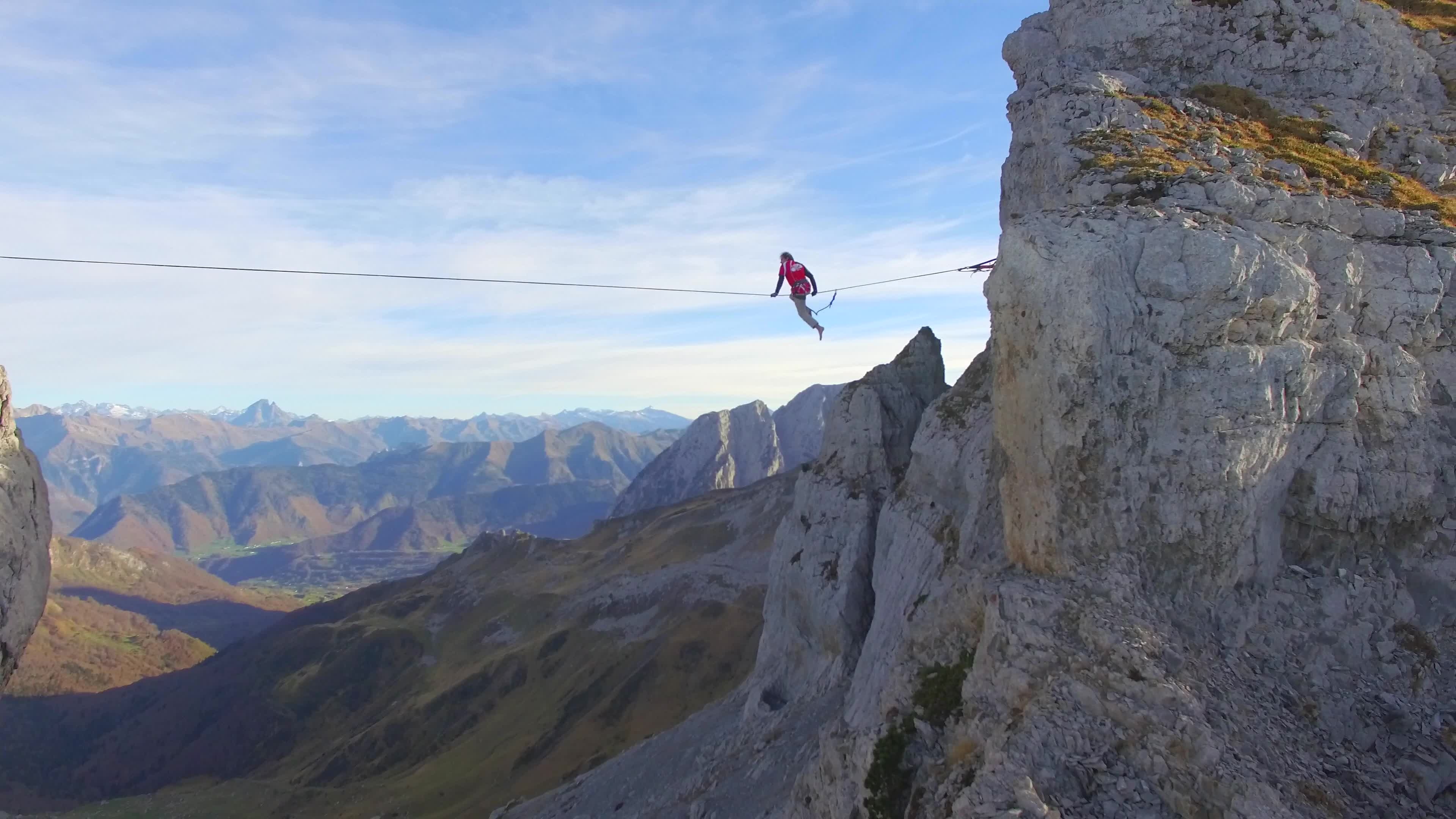 Aerial view of slacklining in the mountains, Fearless balance, Acrobatic display, Majestic scenery, 3840x2160 4K Desktop