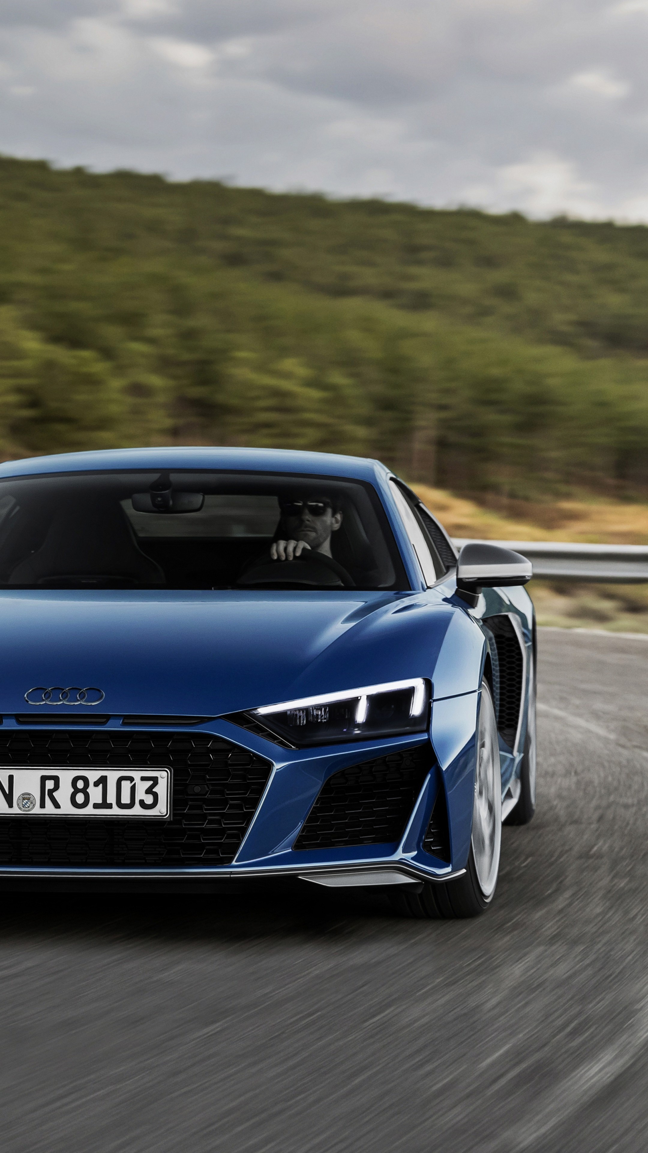Audi R8 V10 Coupe, driver wearing sunglasses, winding asphalt road, 4K Phone wallpaper