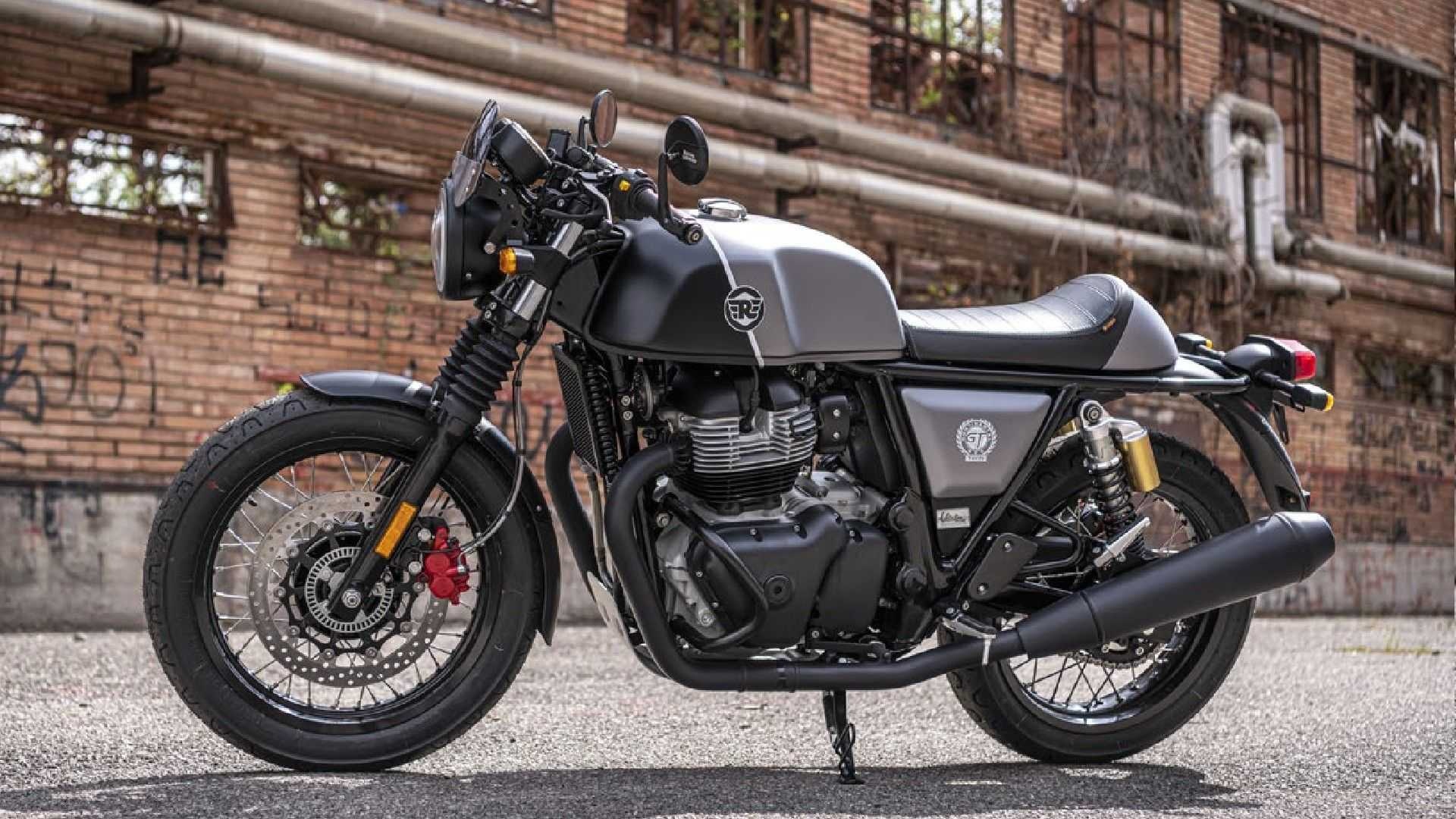 Royal Enfield Continental GT 650, Custom cafe racer motorcycle, Industrial brick building facade, Full HD Desktop wallpaper