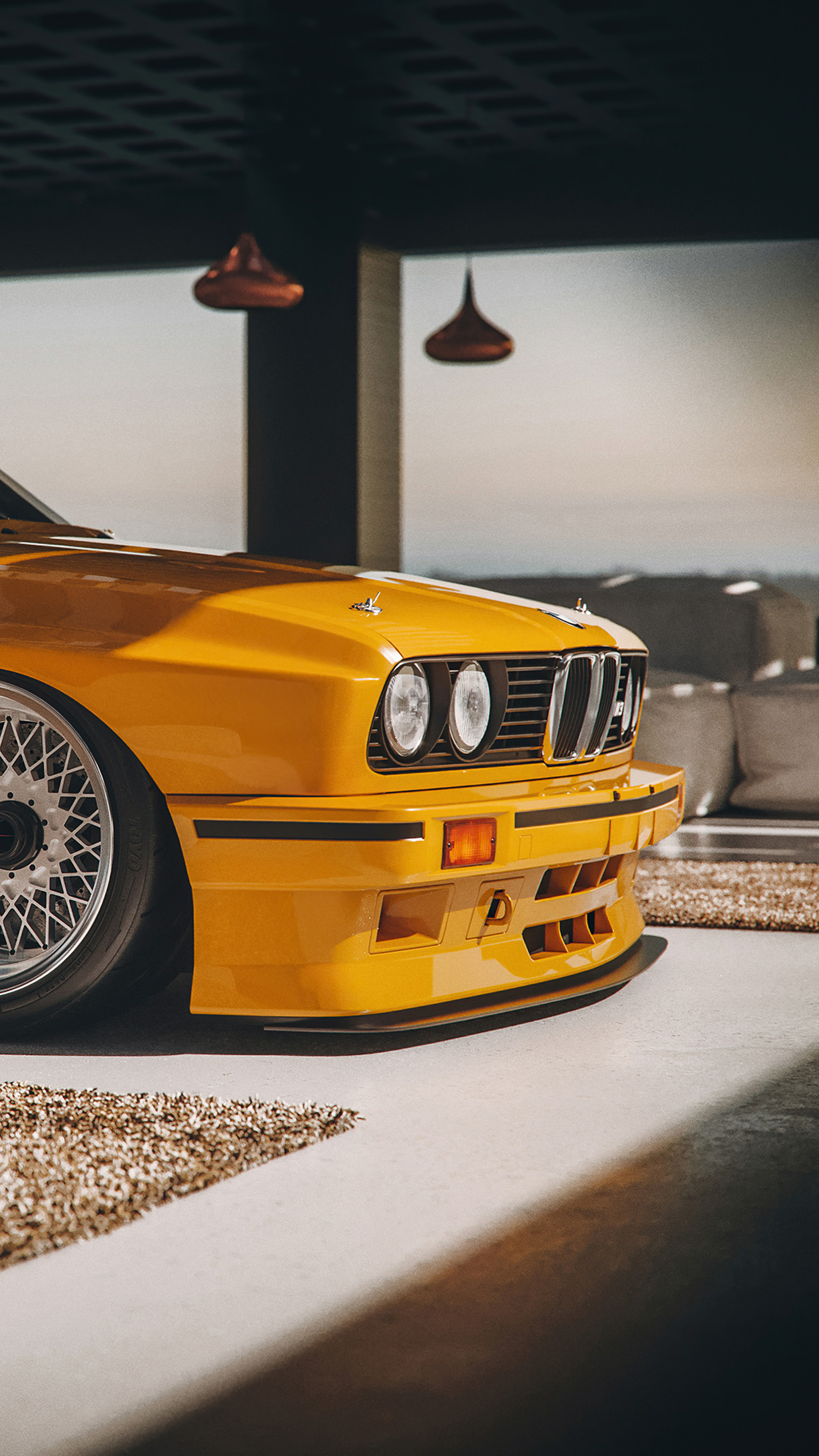 yellow BMW E30 M3, silver mesh wheel, modern luxury garage, 4K Phone wallpaper