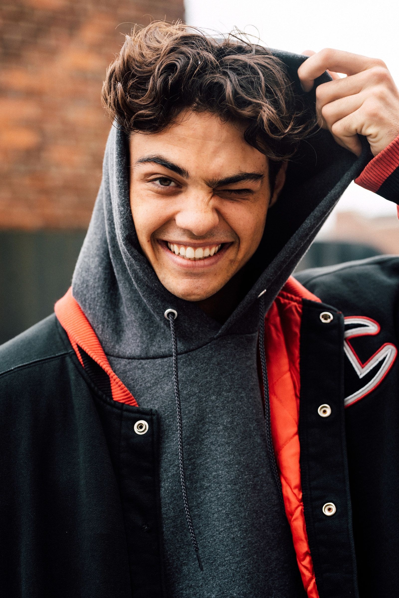 Noah Centineo, Charming actor, Heartthrob status, Rising Hollywood star, 1600x2400 HD Phone