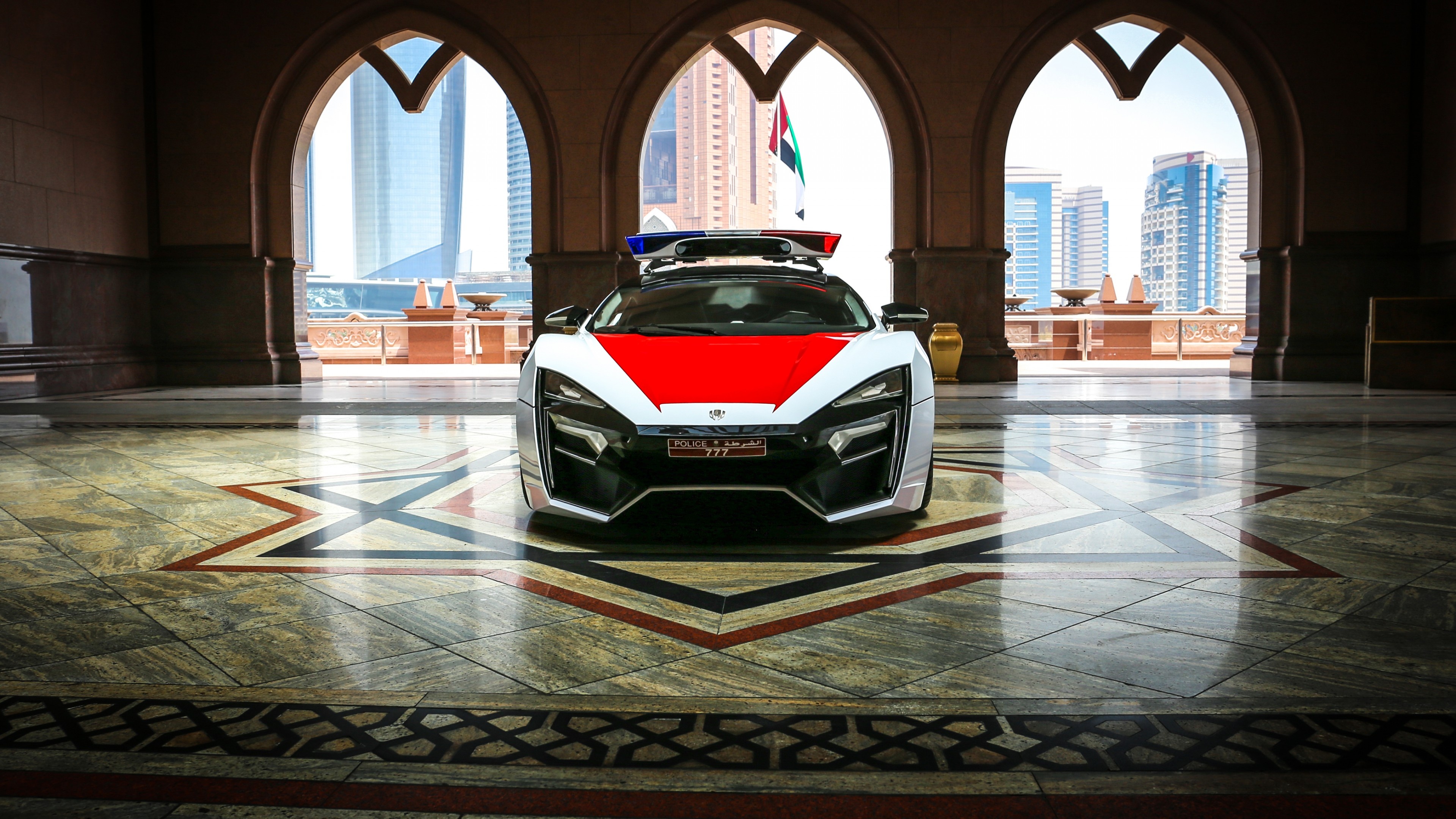 Lykan HyperSport police car, Abu Dhabi Police livery, Emirates Palace archway, 4K Desktop wallpaper