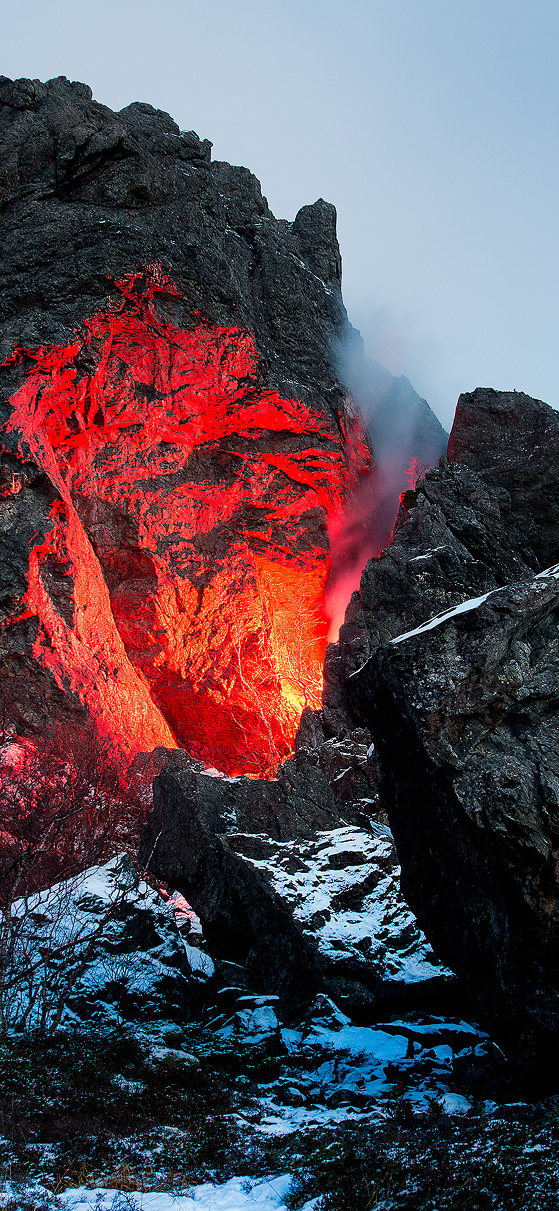 glowing red volcanic fissure, snow covered rocky mountain, rising volcanic steam plume, HD Phone wallpaper