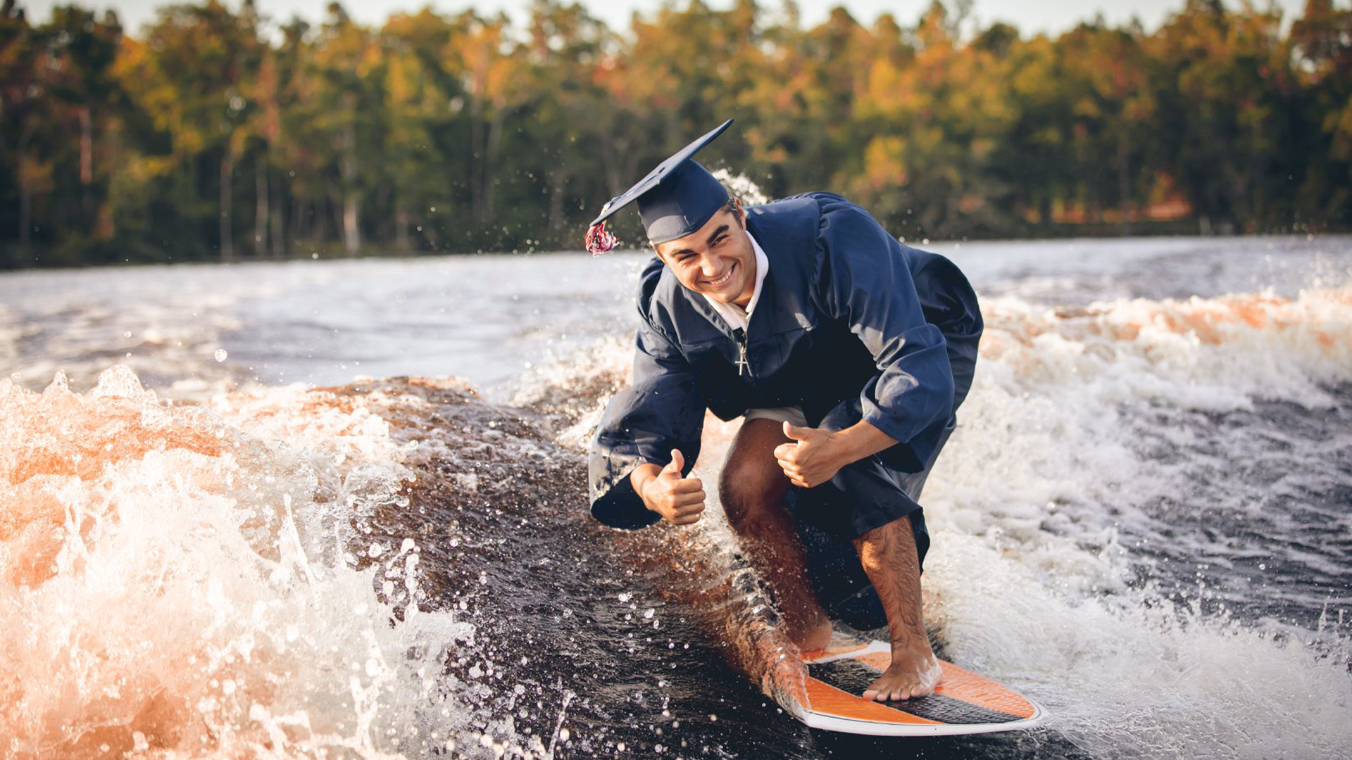Florida graduate, Wakesurfing tricks, Viral graduation moment, Florida, 1920x1080 Full HD Desktop