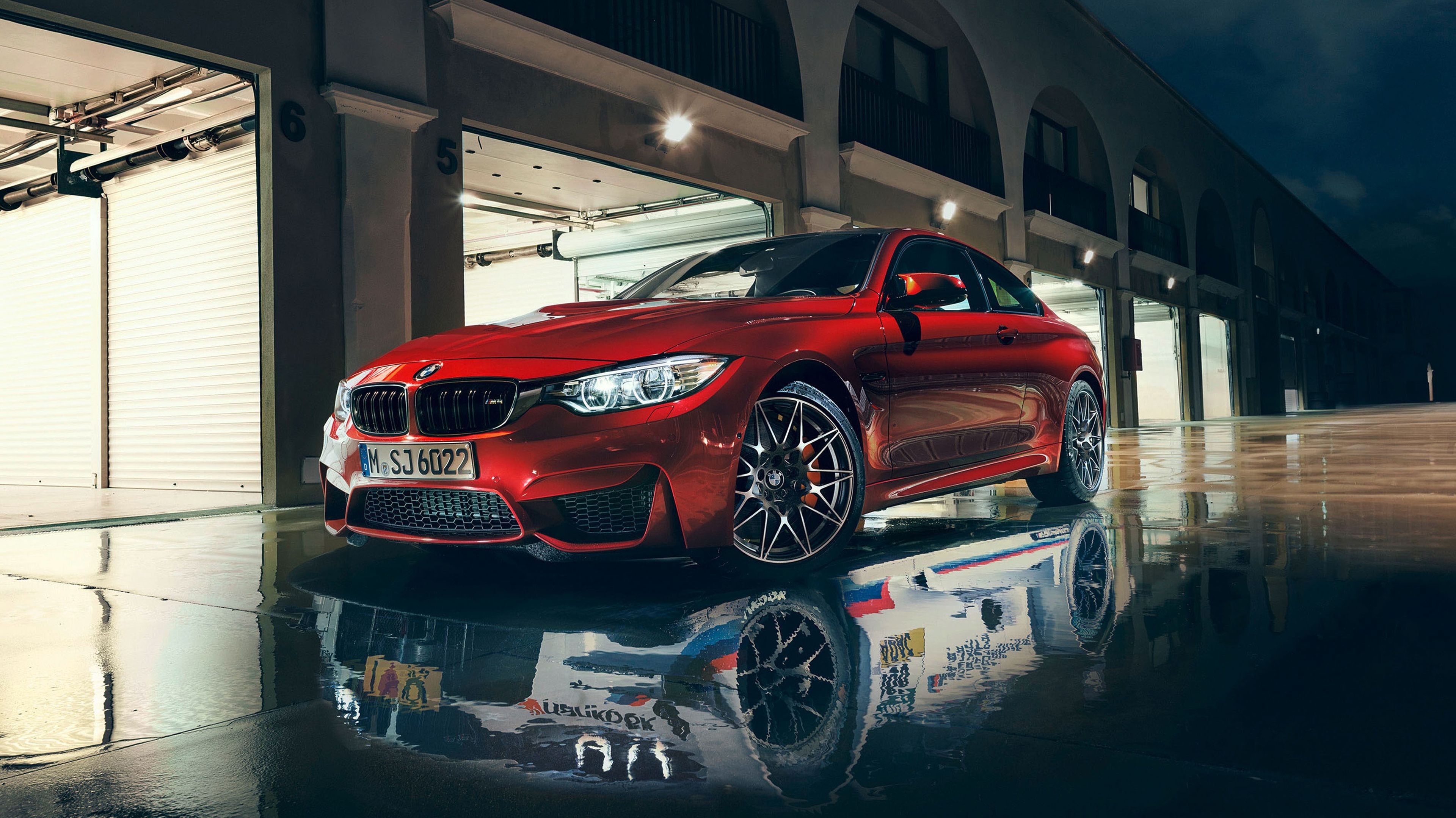 BMW M4 Competition Coupe, Wet pit lane reflection, Illuminated garage paddock, 4K Desktop wallpaper