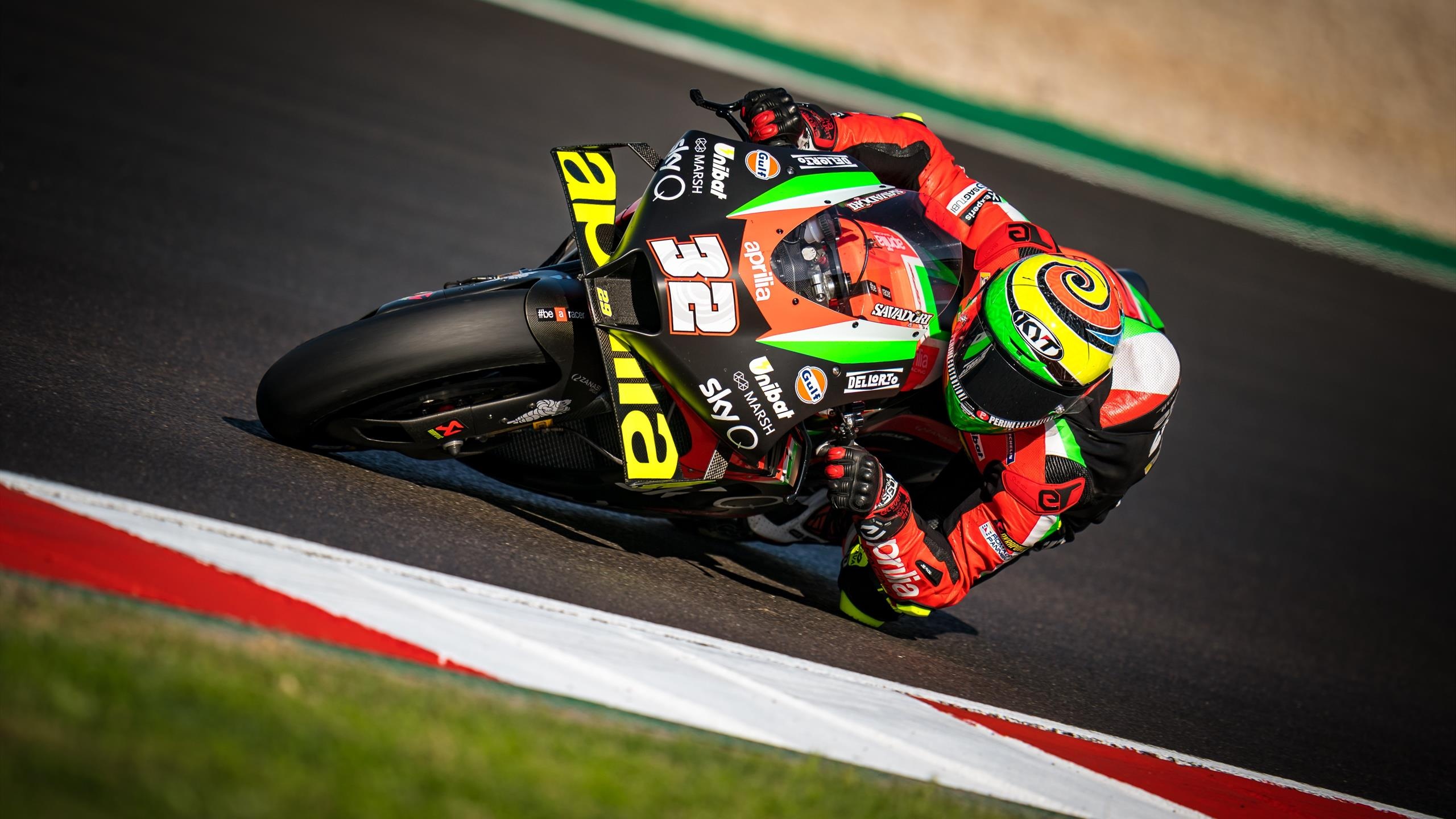 Lorenzo Savadori number 32, Aprilia RS-GP green livery, MotoGP knee down kerb, HD Desktop wallpaper