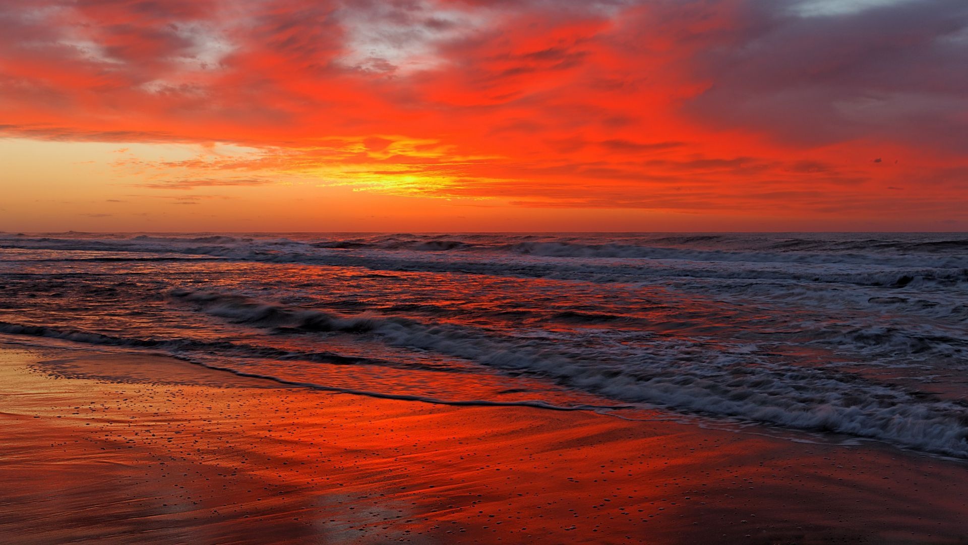 breaking ocean surf, wet reflective beach sand, fiery red sunset clouds, Full HD Desktop wallpaper