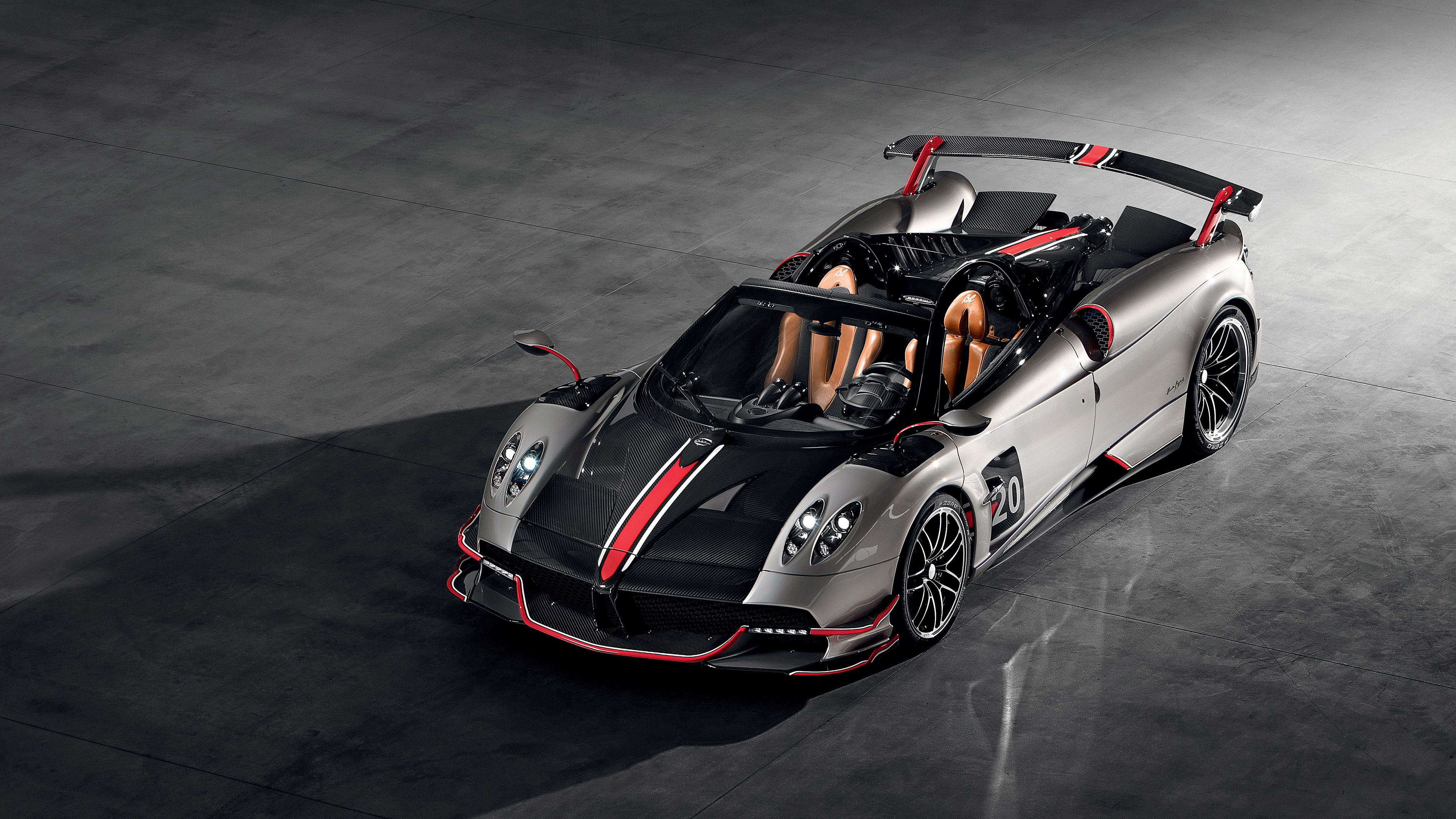 Pagani Huayra Roadster BC, Tan leather bucket seats, Polished concrete studio floor, 4K Desktop wallpaper