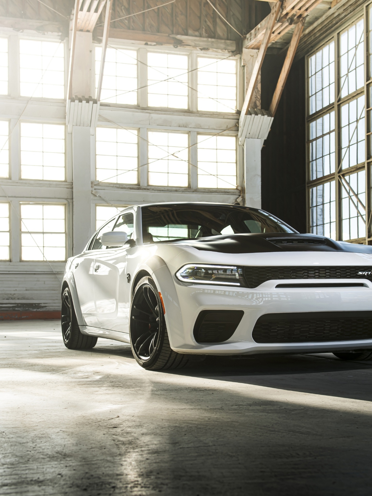 Dodge Charger SRT Hellcat Widebody, sunlit industrial warehouse, matte black vented hood, HD Phone wallpaper