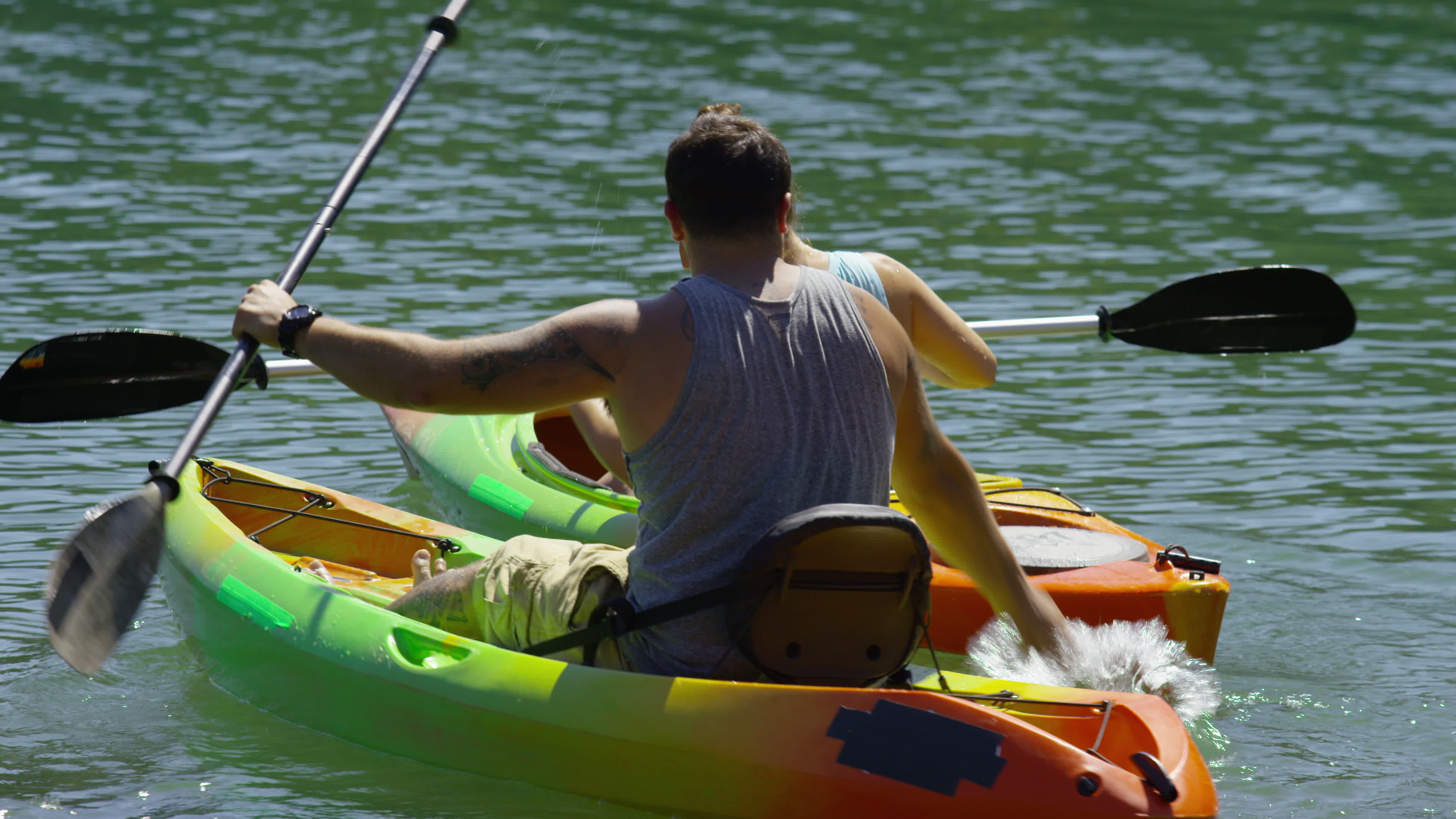 Couple kayaking, in lake, Stock video, 3840x2160 4K Desktop