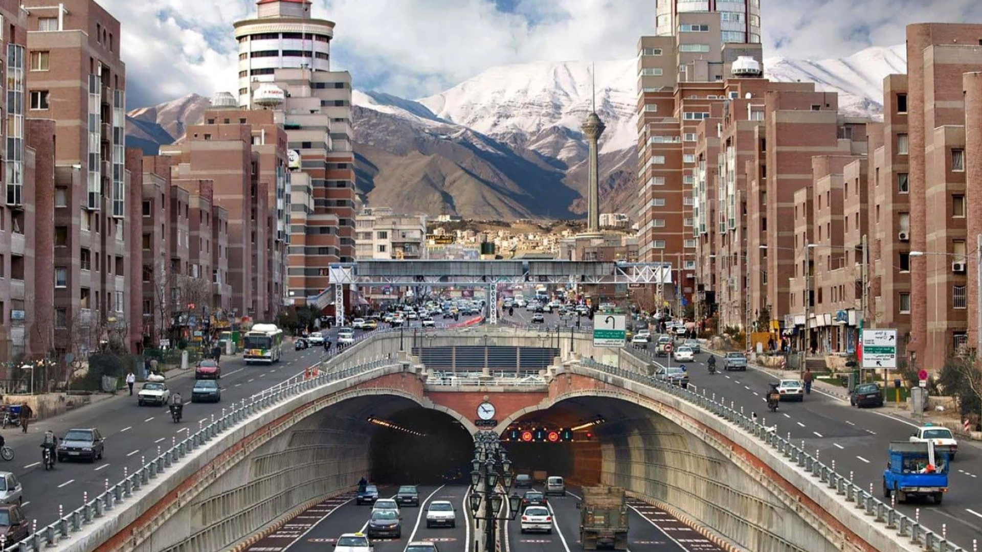 Tohid Tunnel, Milad Tower, snow-capped Alborz Mountains, Full HD Desktop wallpaper