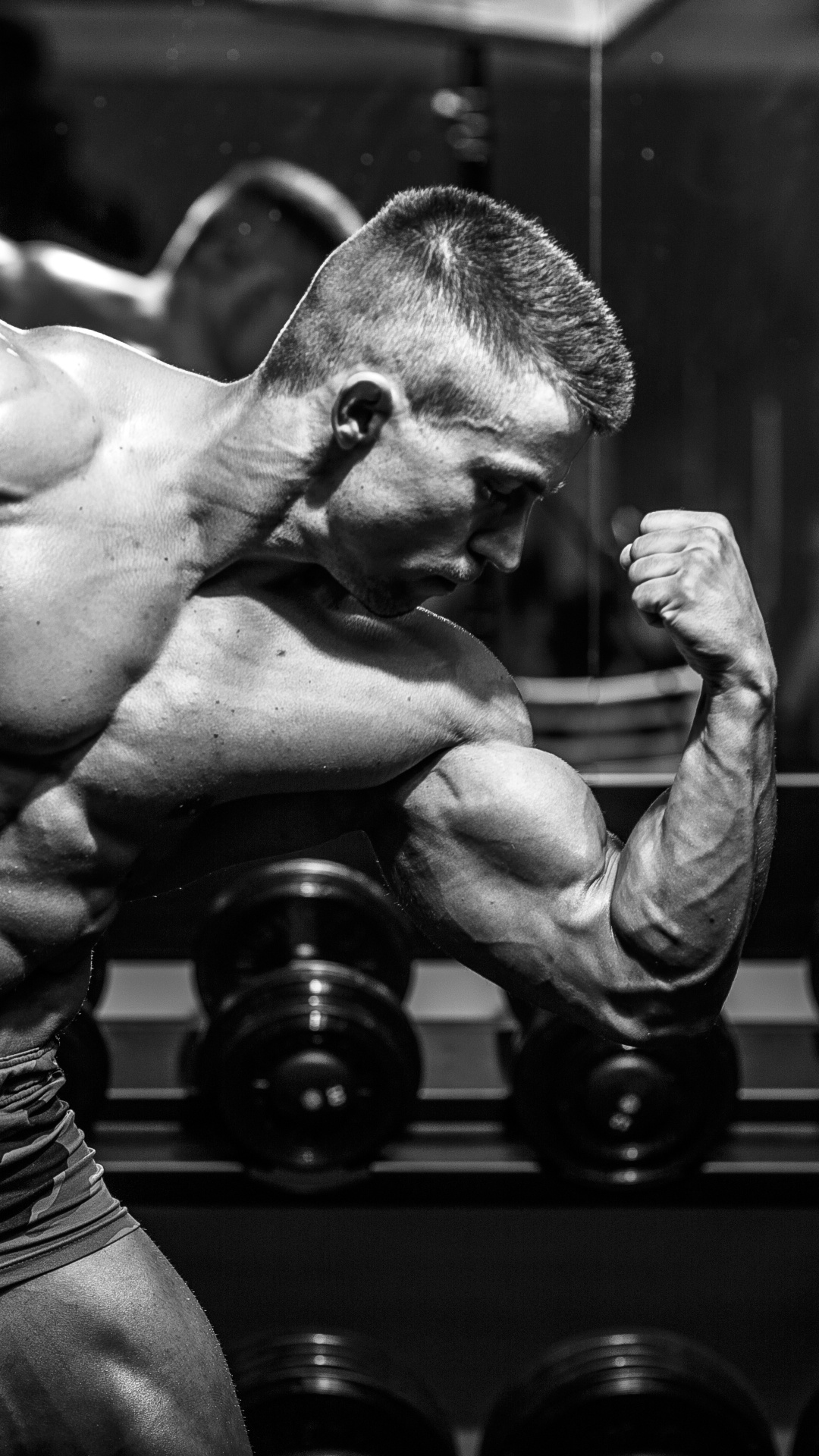 Flexing male bodybuilder, Gym dumbbell rack, Monochrome mirror reflection, Full HD Phone wallpaper