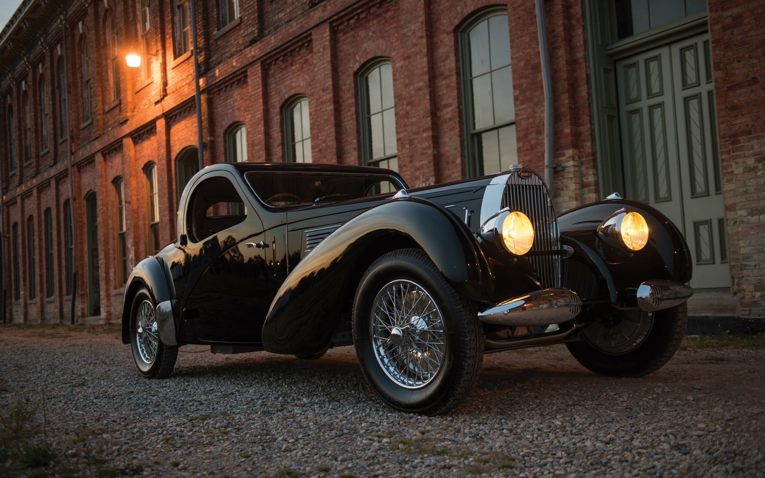 Bugatti Type 57S Atalante, red brick warehouse facade, illuminated vintage headlights, HD Desktop wallpaper