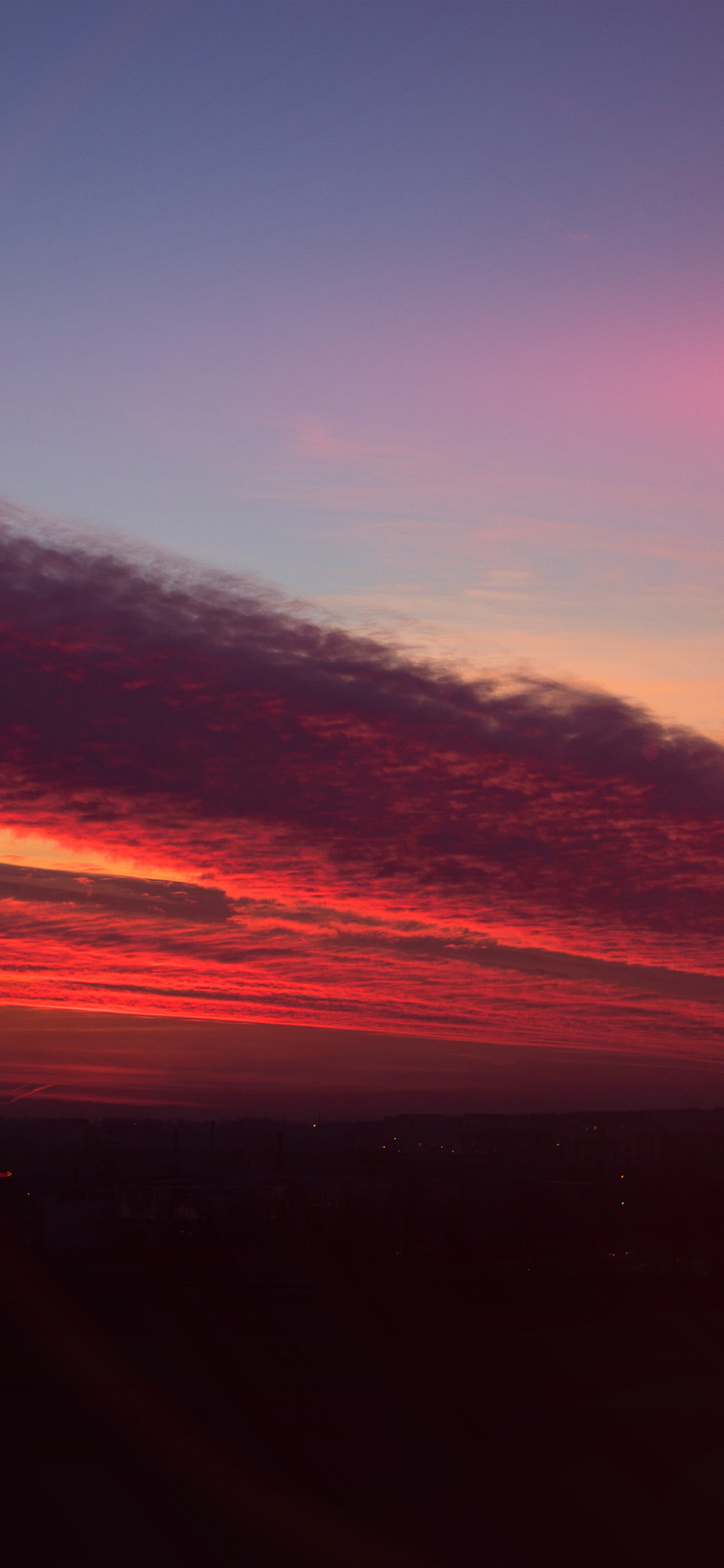 vibrant red sunset clouds, twilight purple sky gradient, dark city horizon silhouette, HD Phone wallpaper