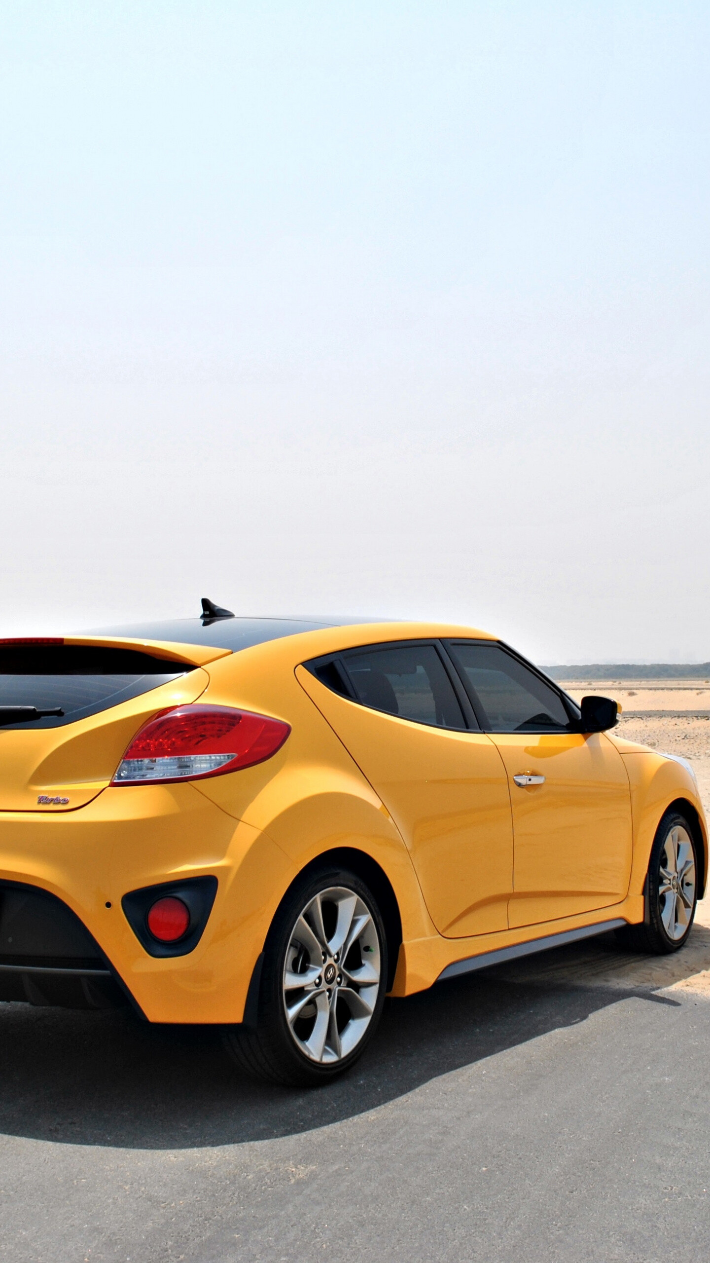 On-road 2019 Hyundai Veloster, Rear view wallpaper, QHD resolution, Sleek design, 1440x2560 HD Phone