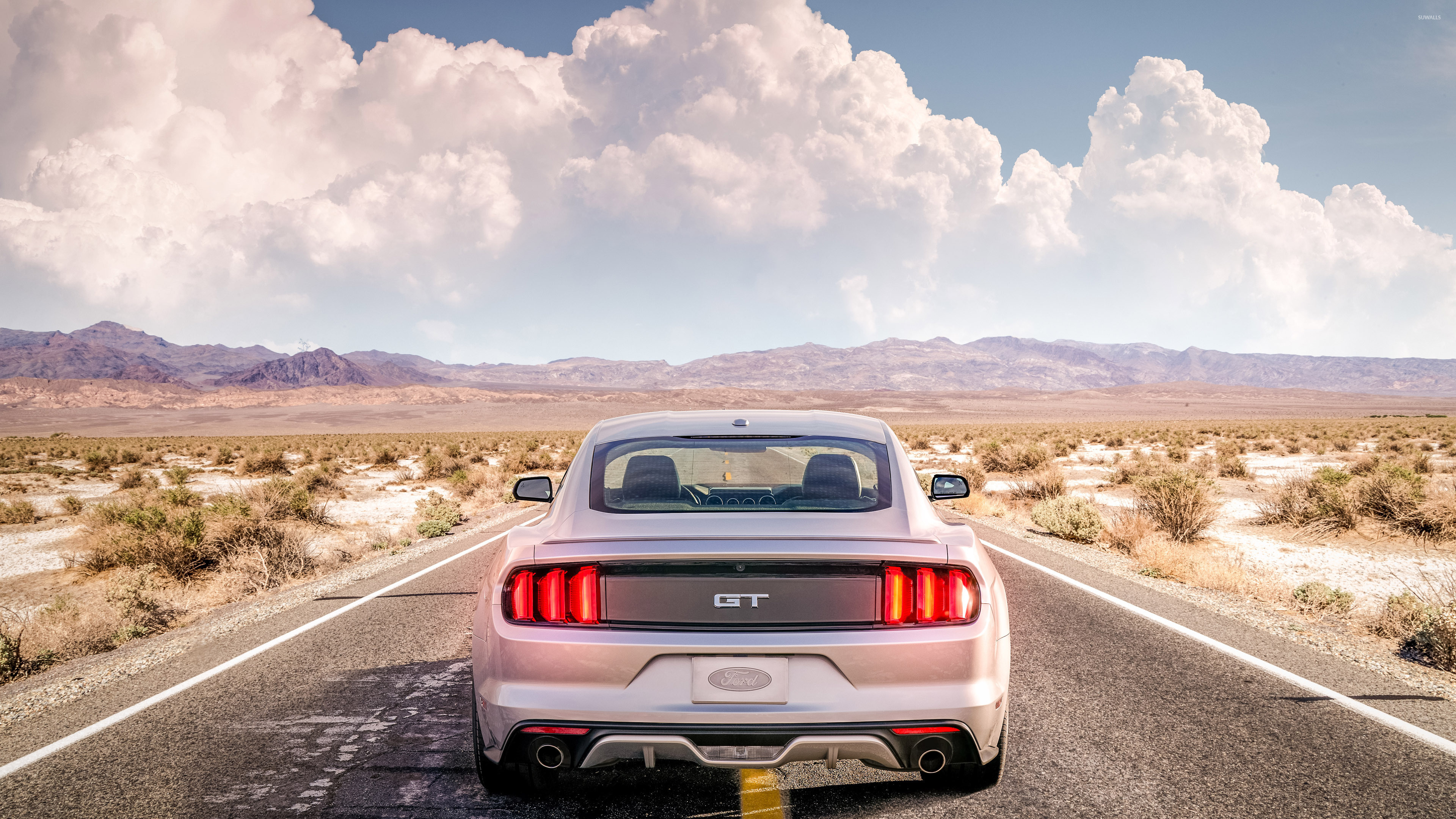 Ford Mustang GT, Desert highway road, Cumulus clouds over mountains, 4K Desktop wallpaper