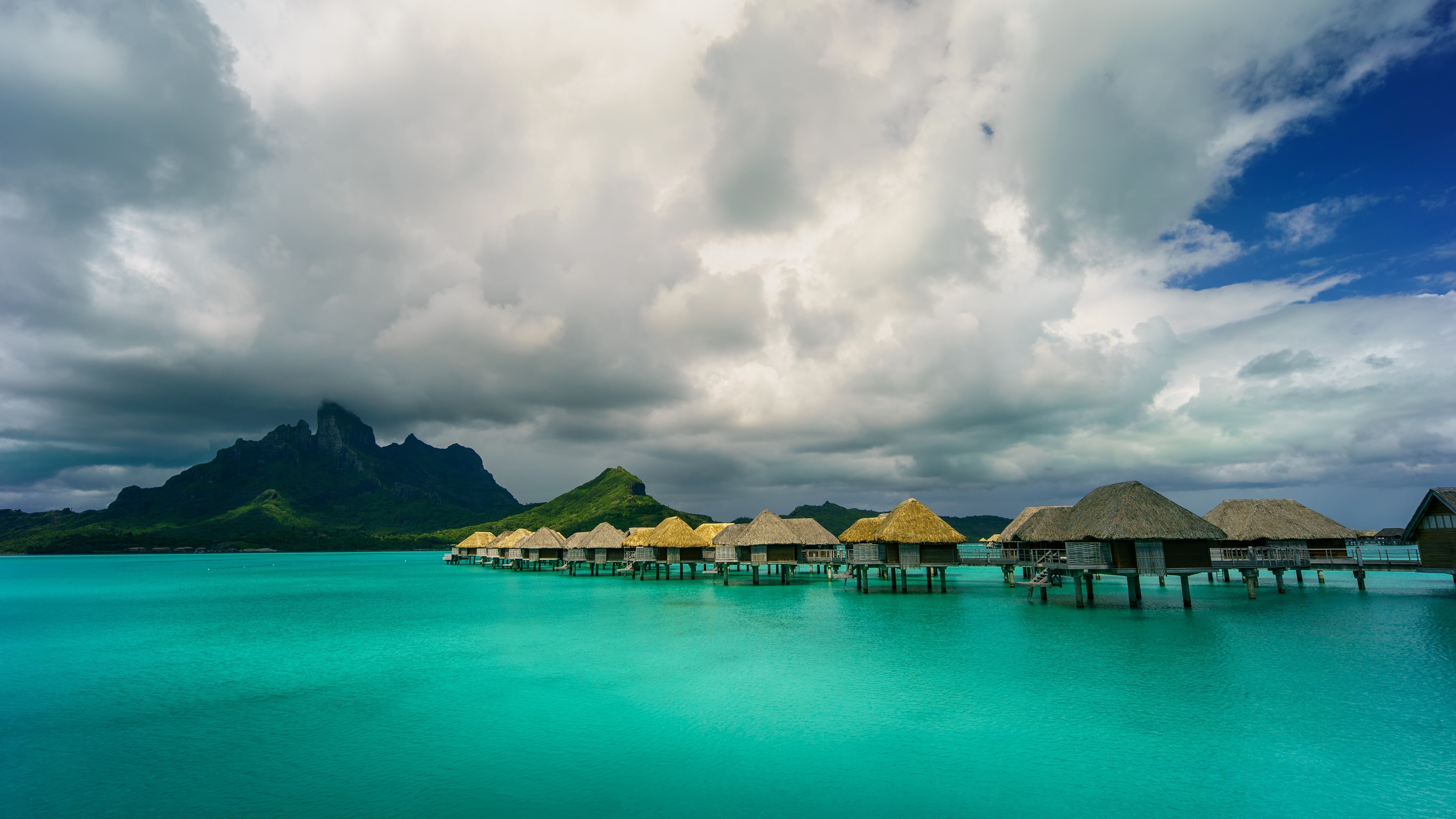 Resort in Bora Bora, Ultra HD wallpaper, Serene tropical beauty, Clouds over the island, 3840x2160 4K Desktop