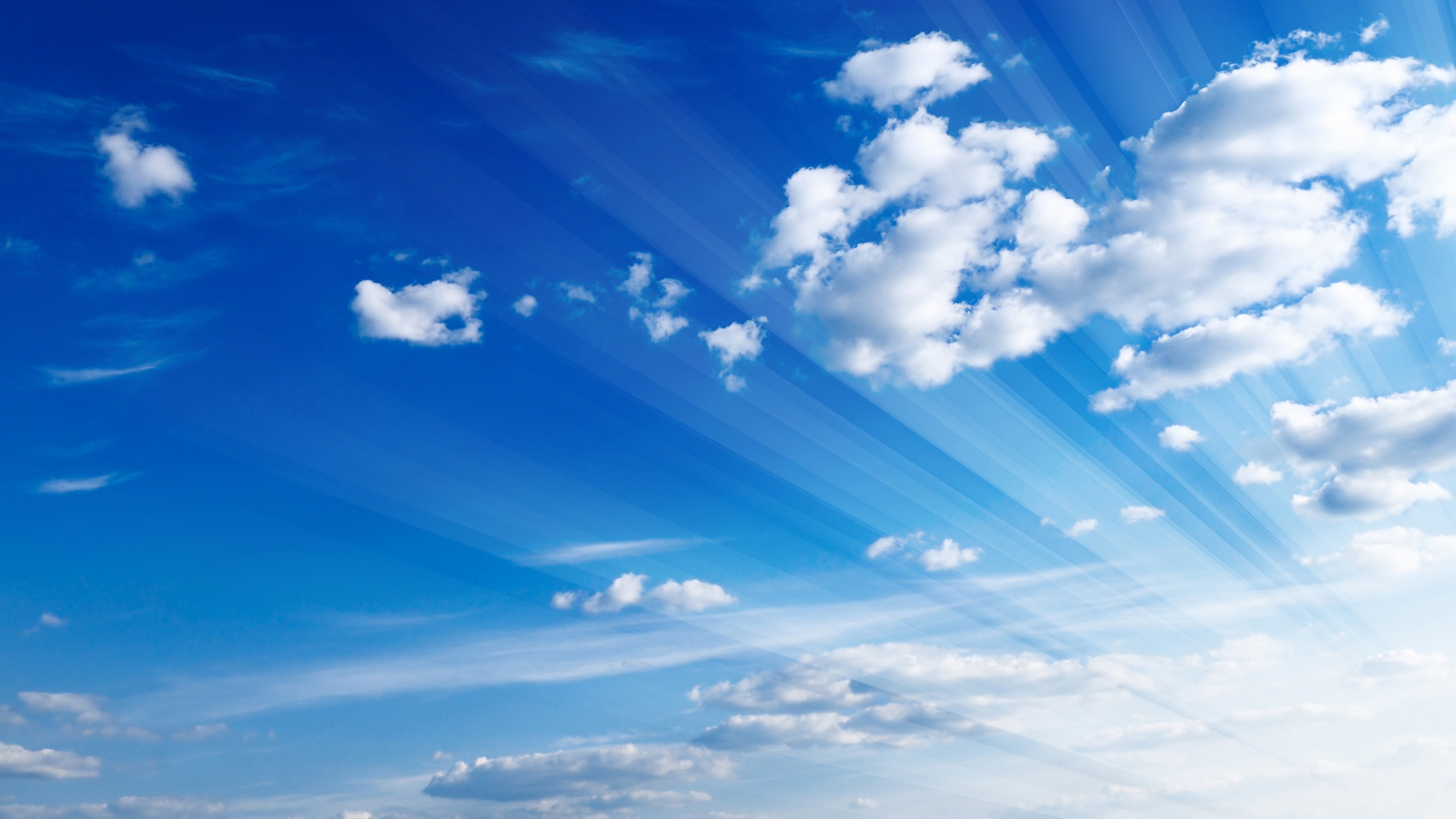 radiant crepuscular rays, white cumulus clouds, bright blue sky, 4K Desktop wallpaper