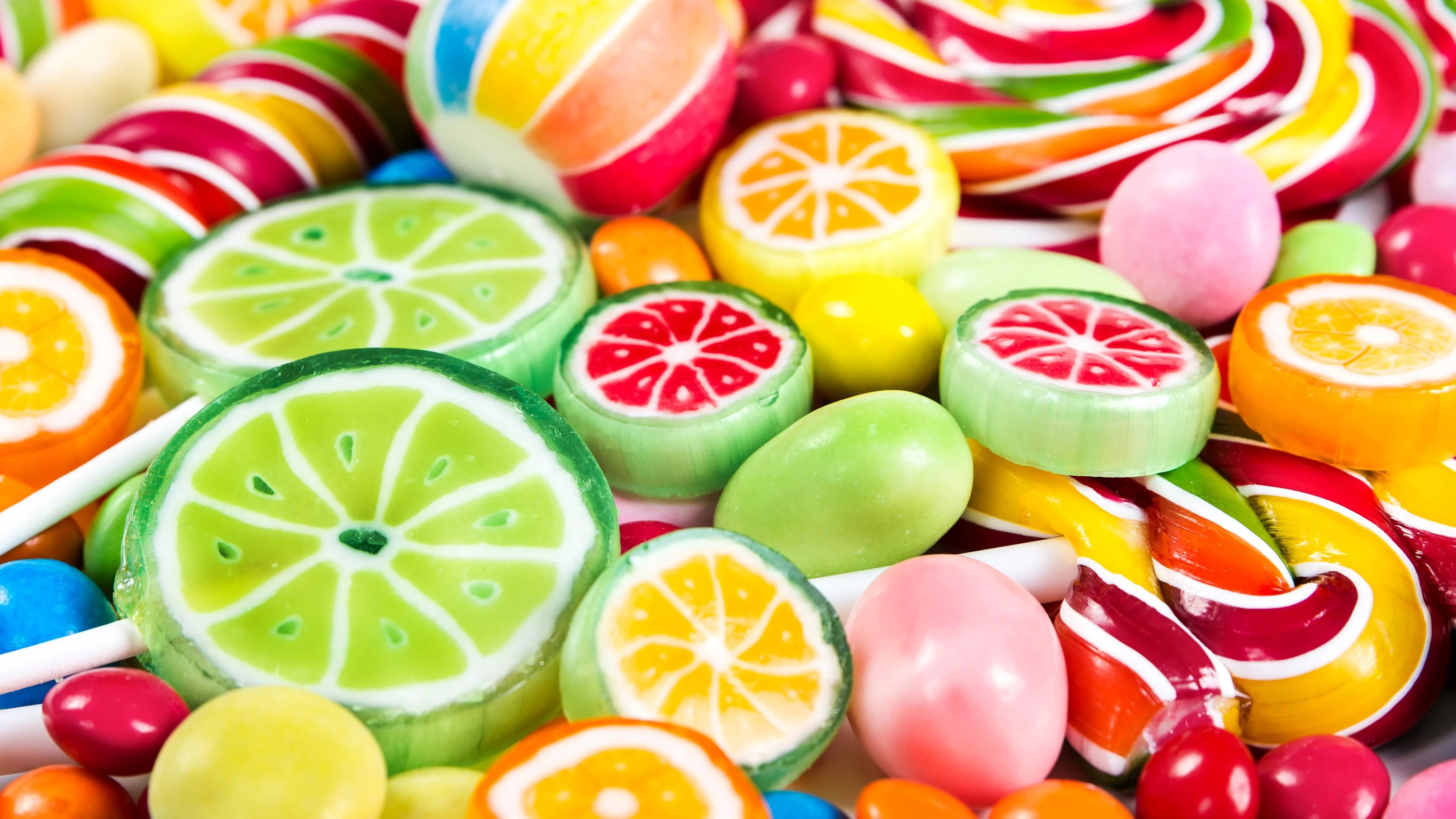 Candy-themed laptop wallpaper, Playful and colorful, Sweet indulgence, Eye-catching design, 3840x2160 4K Desktop