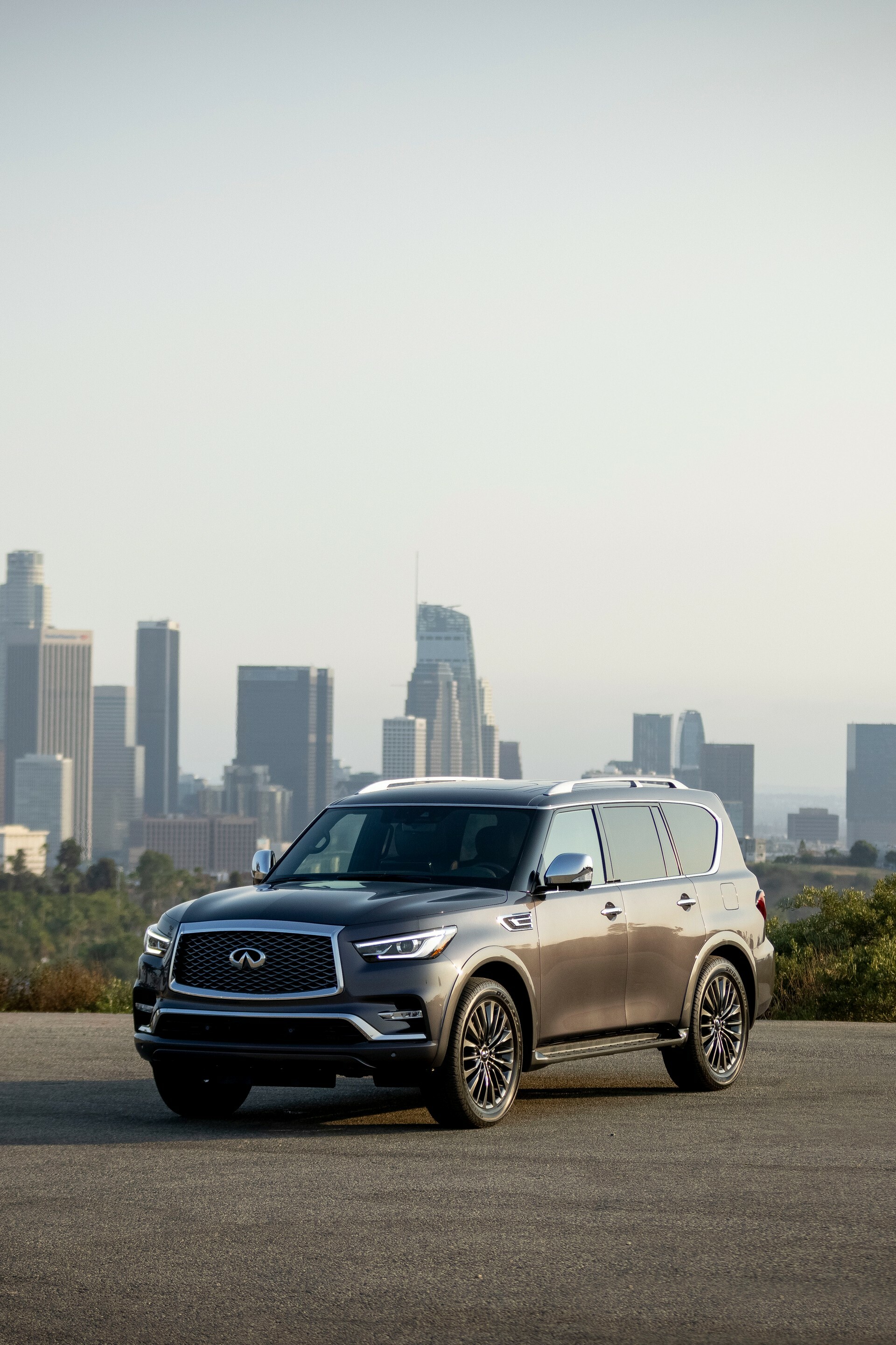 2022 Infiniti QX80, Front three-quarter view, New and exciting, Luxury SUV, 1920x2880 HD Phone