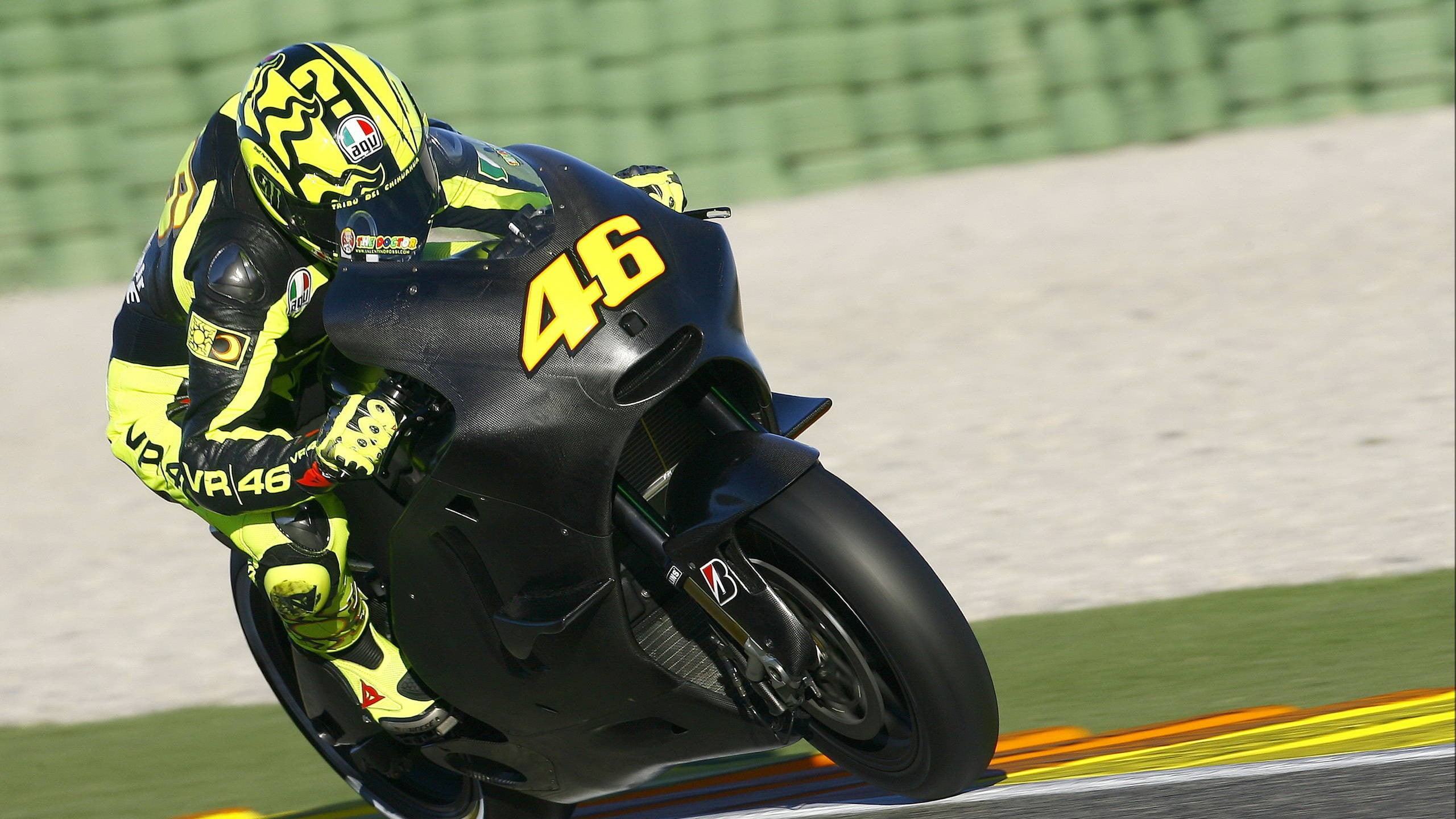 Motorcycle Racing, Blurred speed, Valentino Rossi, Adrenaline rush, 2560x1440 HD Desktop