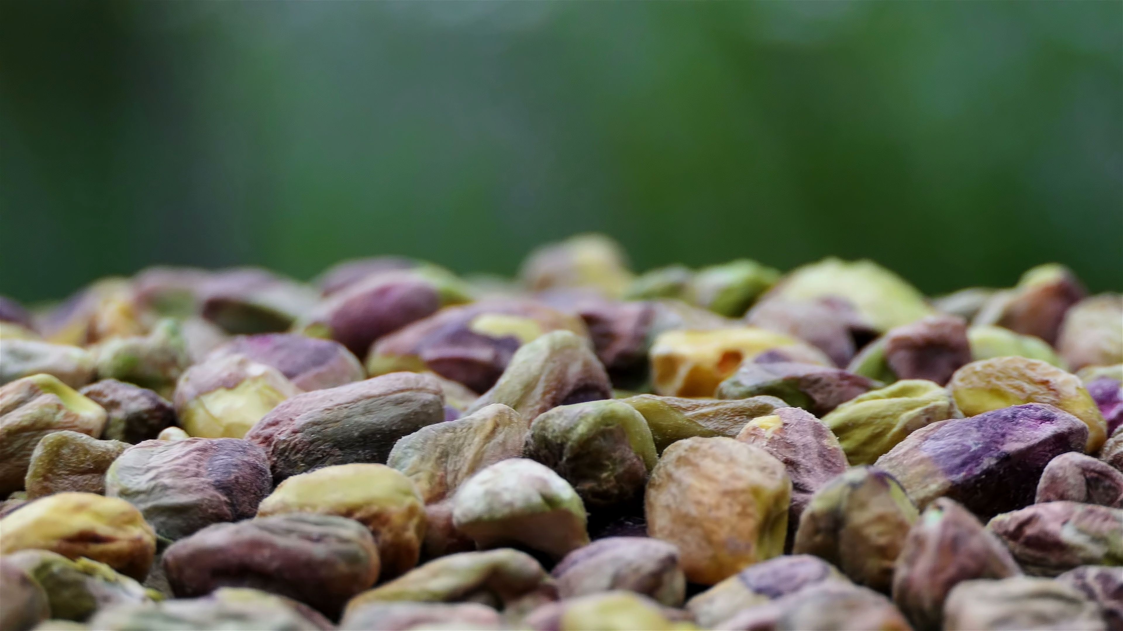 Pistachio nuts, Slow motion, Green background, Organic, 3840x2160 4K Desktop