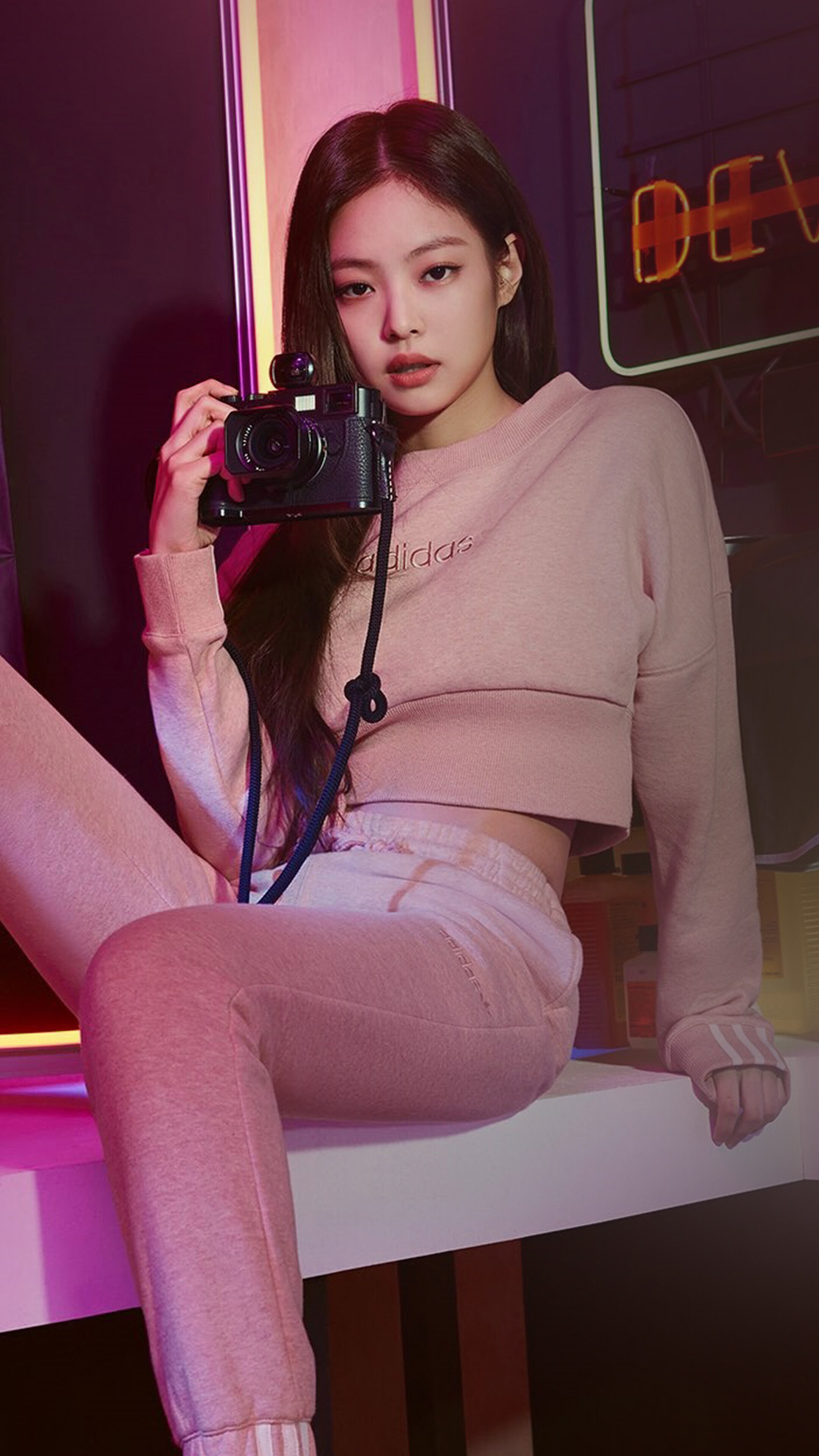Jennie Kim, pink Adidas tracksuit, black rangefinder camera, 4K Phone wallpaper