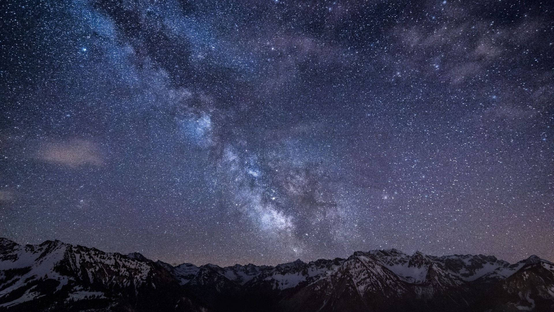 Milky Way galaxy, snow-covered mountain range, starry night sky, Full HD Desktop wallpaper