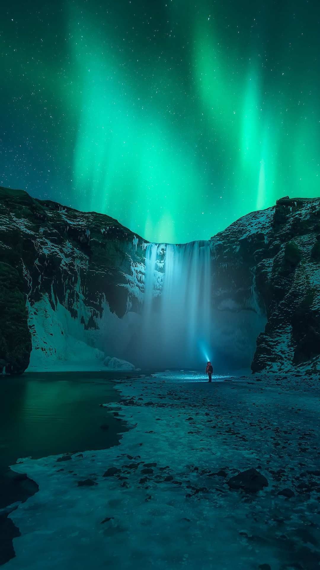 Skógafoss waterfall, Green aurora borealis, Hiker with headlamp, Full HD Phone wallpaper