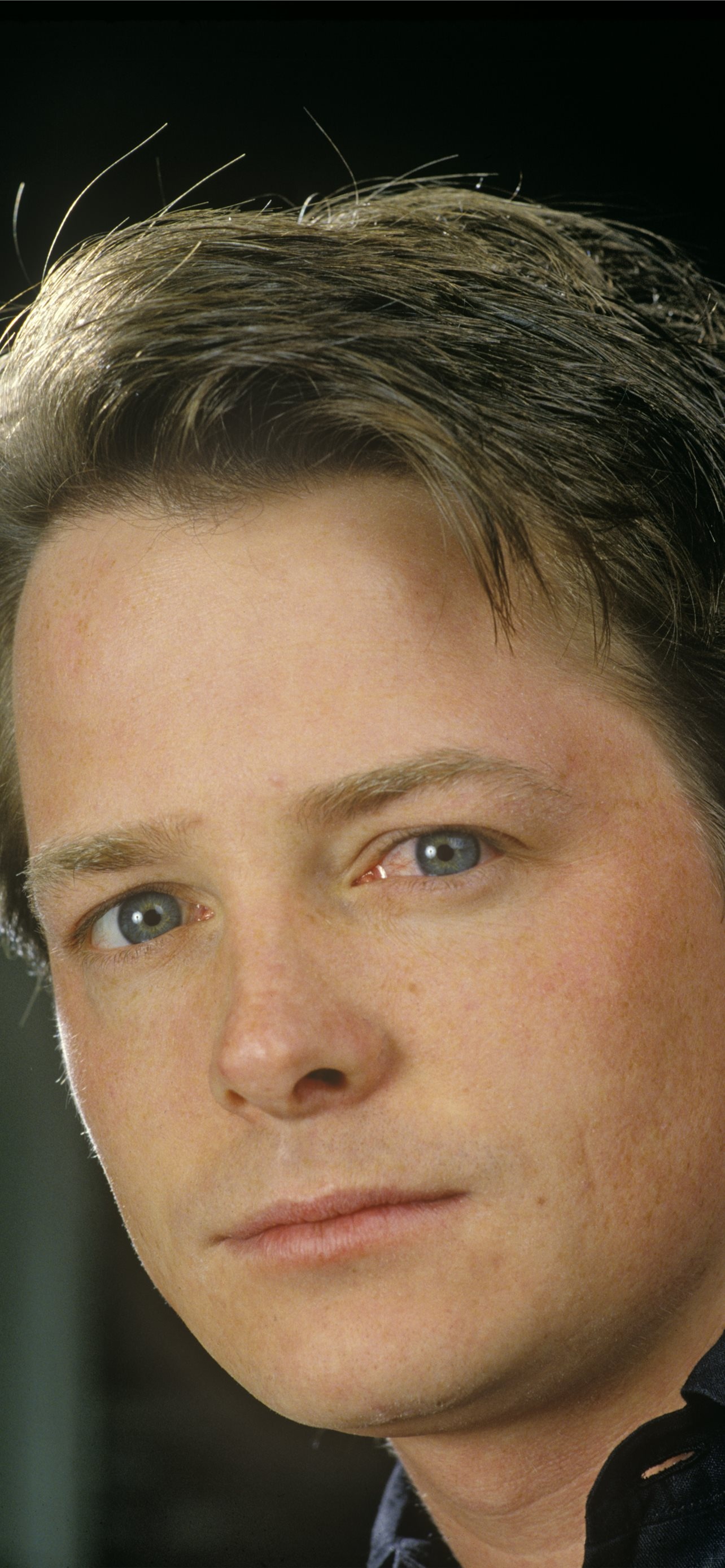 Michael J. Fox, Movies icon, Charismatic performer, Endearing presence, 1290x2780 HD Phone