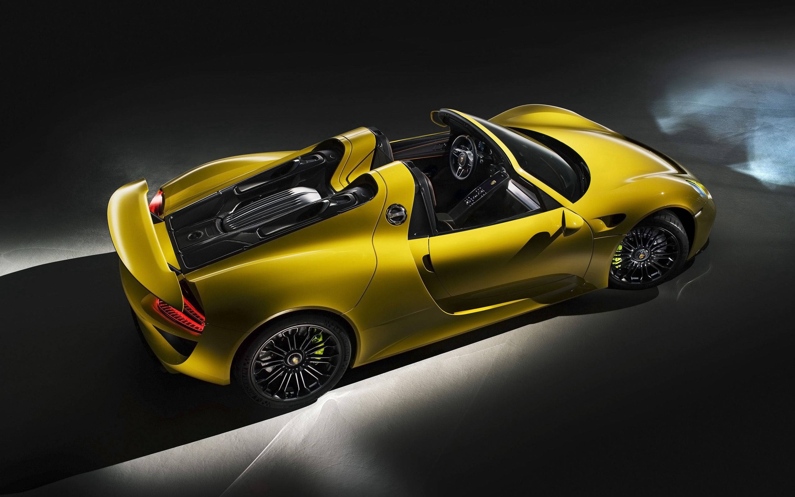 Porsche 918 Spyder Concept, High-angle three-quarter rear view, Dark studio lighting, HD Desktop wallpaper
