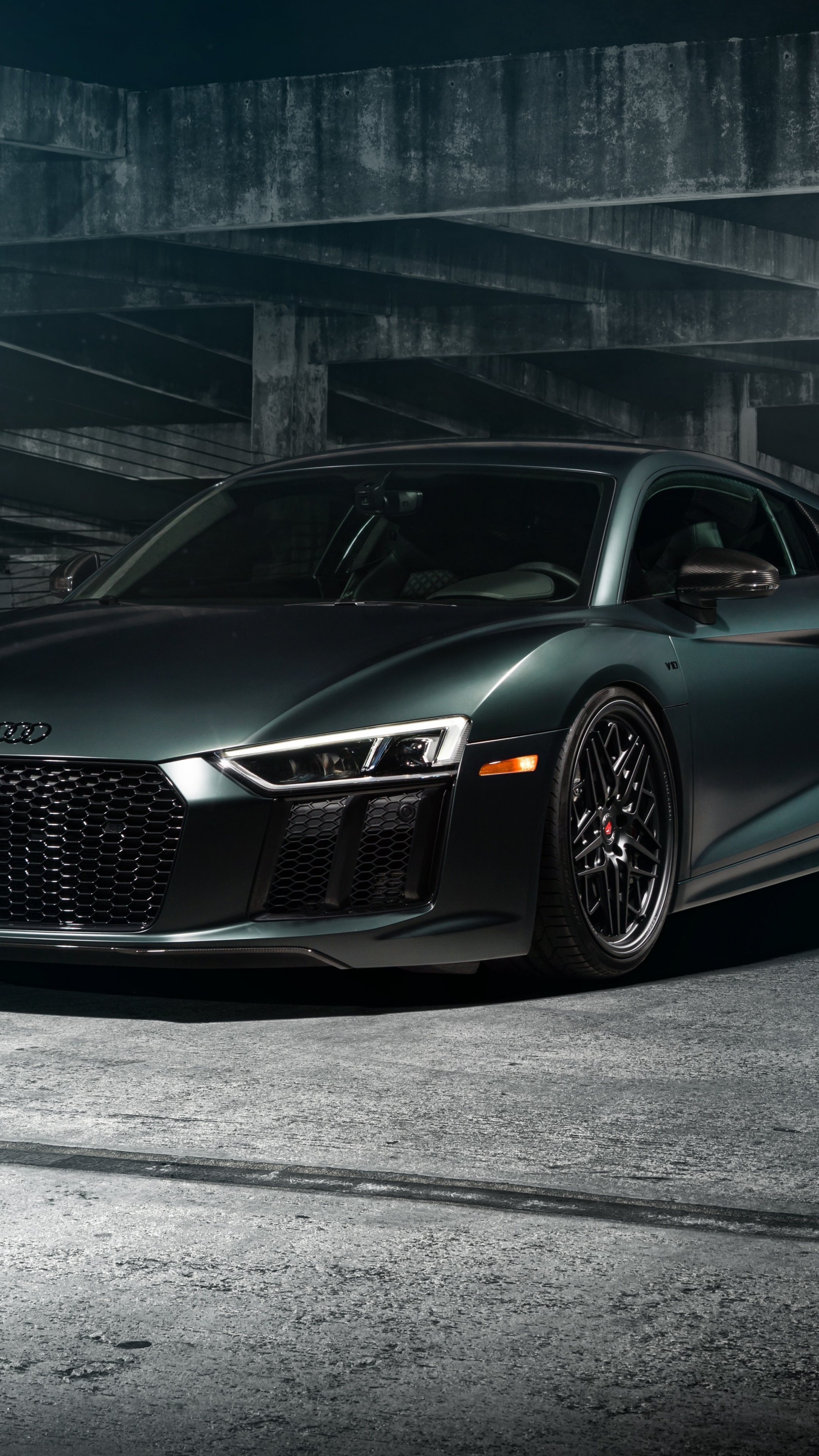 Audi R8 V10 Coupé, concrete parking garage, matte dark green finish, 4K Phone wallpaper